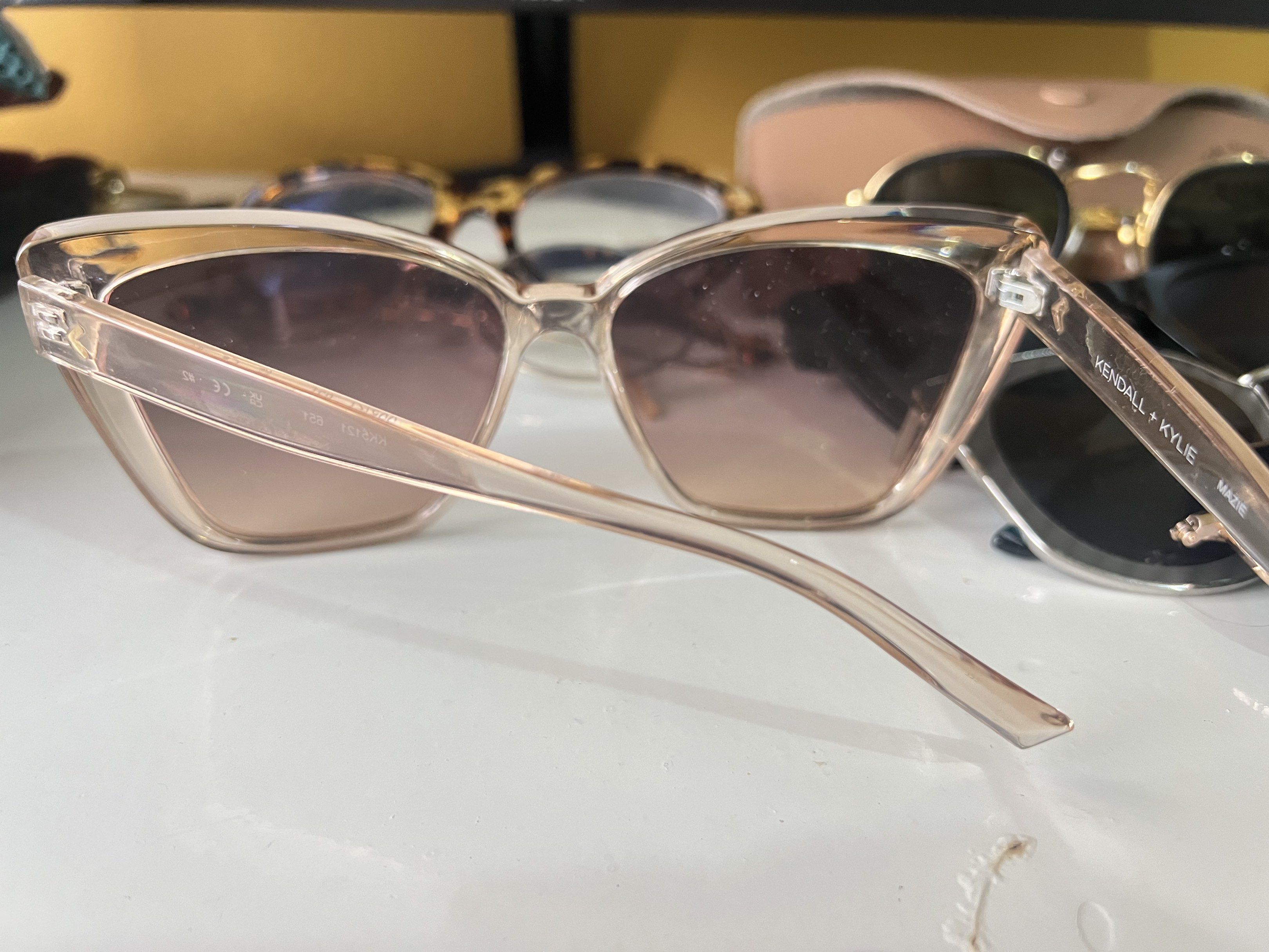 Kendall + Kylie Mazie Sunglasses (Category: Sunglasses & Eyewear) located in Quezon City. Submitted by bubspreloved (Listing ID 1418076894, Image 3). Description: - Kendall + Kylie Mazie sunglasses - Light brown frame - Gradient lenses - Modern square shape - Brand and model visible on arm - Great for sunny days.