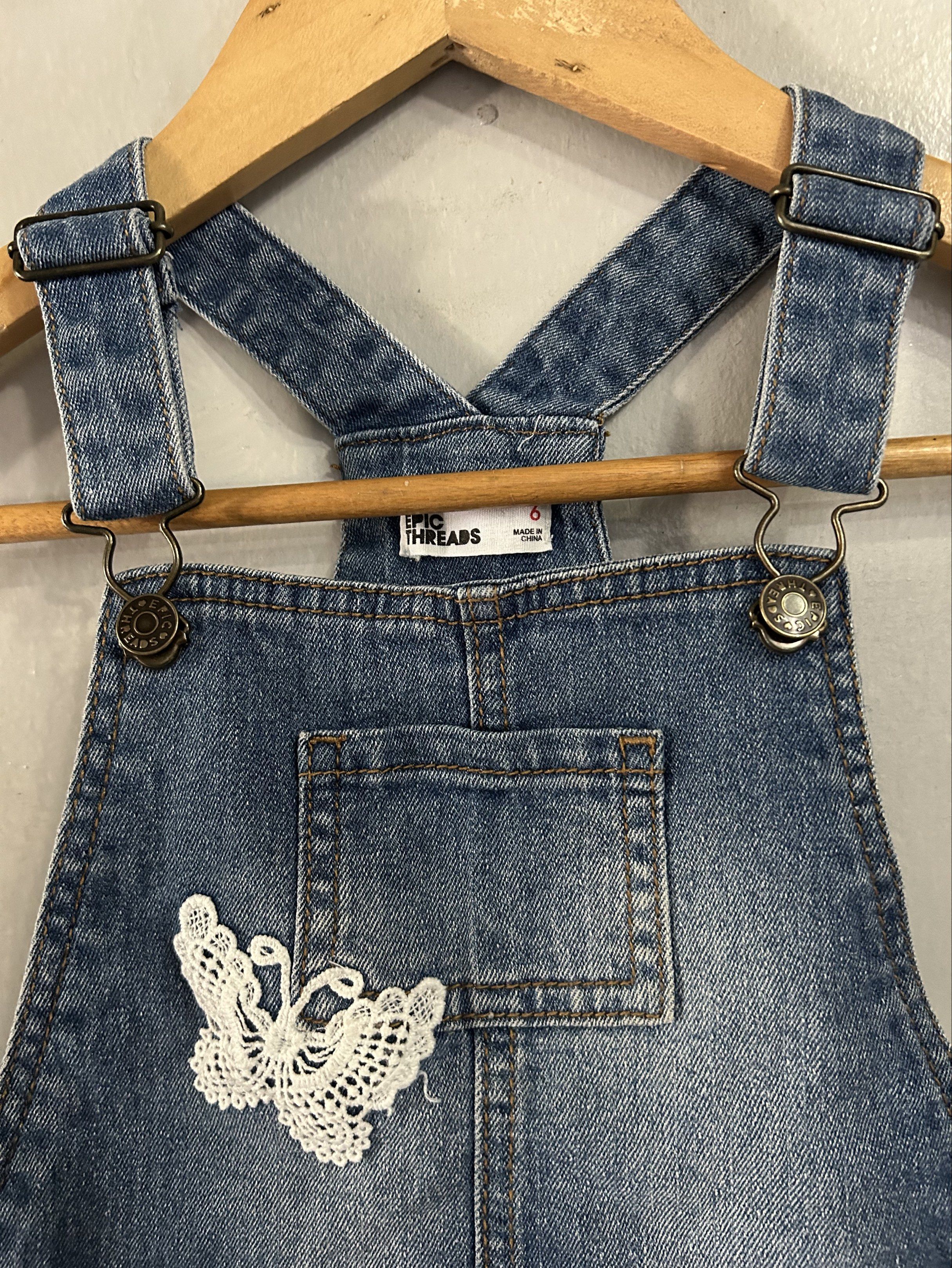 Kids denim jumper (Category: Babies & Kids Fashion) located in General Trias. Submitted by theosdeclutter (Listing ID 1418143075, Image 2). Description: Size - 6 on tag.