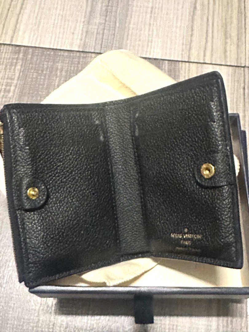 Louis Vuitton Lisa Empreinte Leather (Category: Luxury Bags & Wallets) located in Manila. Submitted by aidel_dc (Listing ID 1418142975, Image 3). Description: - Authentic Louis Vuitton Zippy Wallet - Black leather exterior with embossed LV monogram - Includes original box, dust bag, paper bag, and authenticity card - Zip closure - Multiple card slots - Black leather interior - Lightly used but no flaws.
