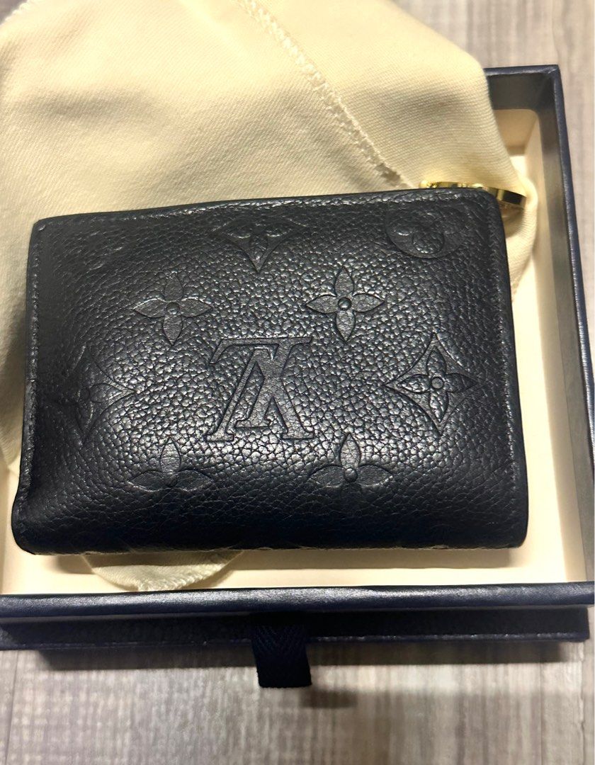 Louis Vuitton Lisa Empreinte Leather (Category: Luxury Bags & Wallets) located in Manila. Submitted by aidel_dc (Listing ID 1418142975, Image 2). Description: - Authentic Louis Vuitton Zippy Wallet - Black leather exterior with embossed LV monogram - Includes original box, dust bag, paper bag, and authenticity card - Zip closure - Multiple card slots - Black leather interior - Lightly used but no flaws.