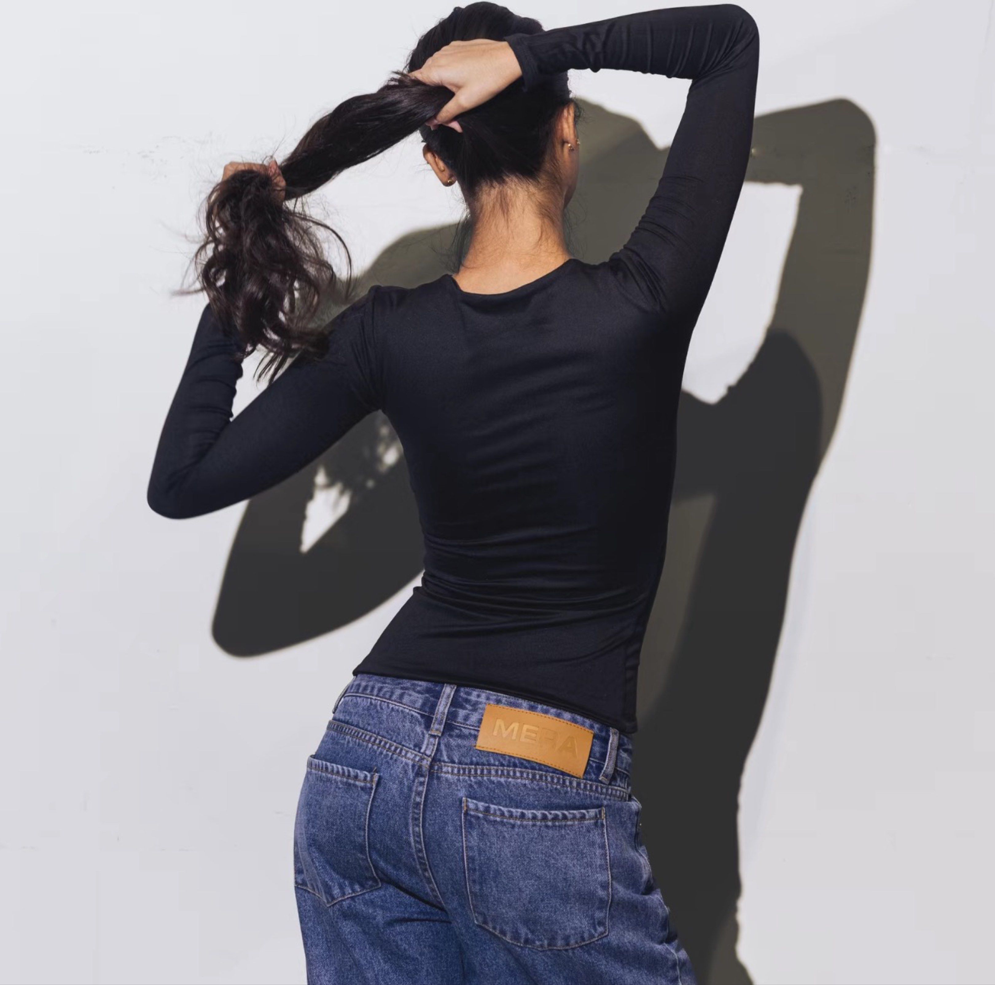 Mera Black Olga Longsleeve Slim-fitting Top (Category: Longsleeves) located in Mandaluyong City. Submitted by minasitems (Listing ID 1418166458, Image 2). Description: Bought but never worn, in super good condition! Have the other colors and its super presko :) Size on tag: XL but runs small (best fits 38C, 28 waistline, but super stretchable regardless!) 📌 Dimensions (when laid flat): Chest: 16 in Length: 21 in 📌 MOP: GCash 📌 MOD: Lalamove/Gr