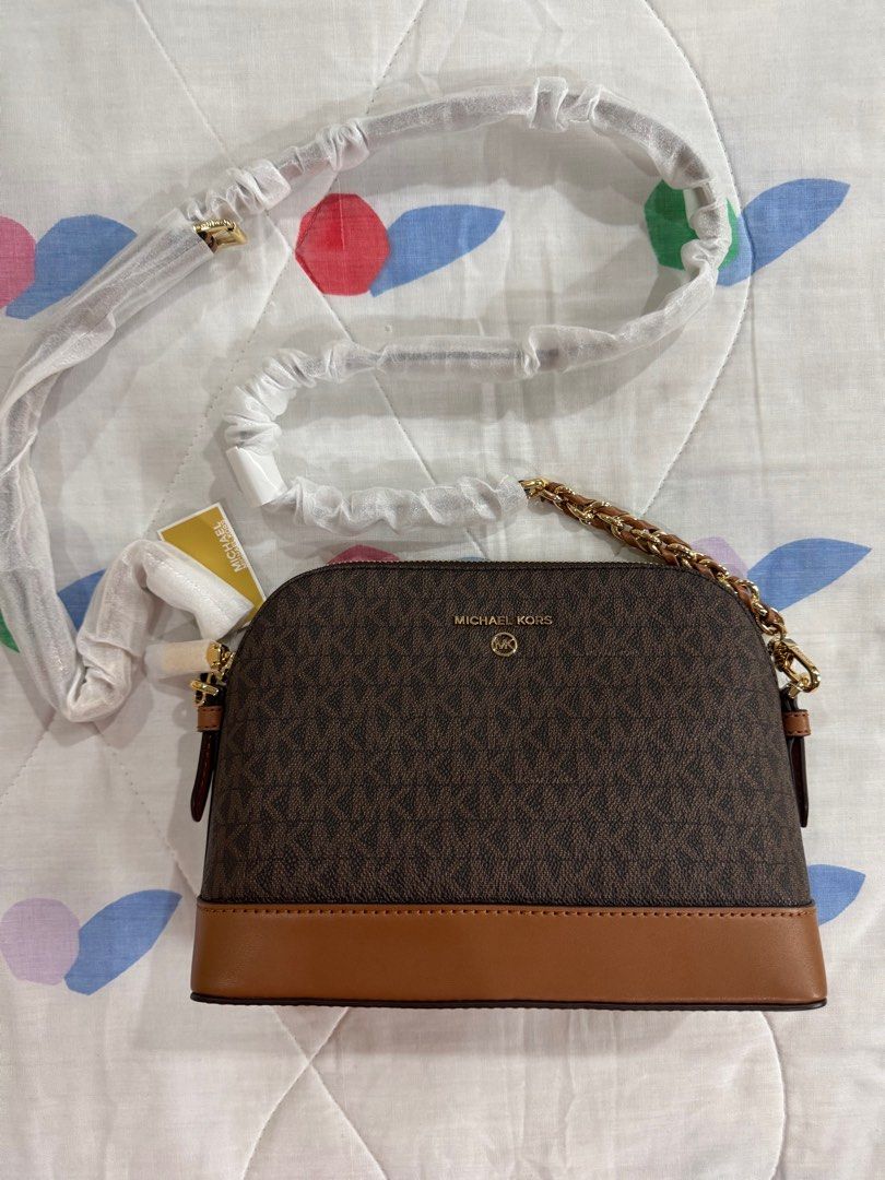 Michael Kors Large Logo Dome Crossbody Bag (Category: Cross-body Bags) located in Manila. Submitted by pollipatti (Listing ID 1418071741, Image 1). Description: Brand new from the US 100% authentic Guaranteed money back if proven fake Location: Sta. Ana, Manila or Katipunan, QC Shipping co buyer .