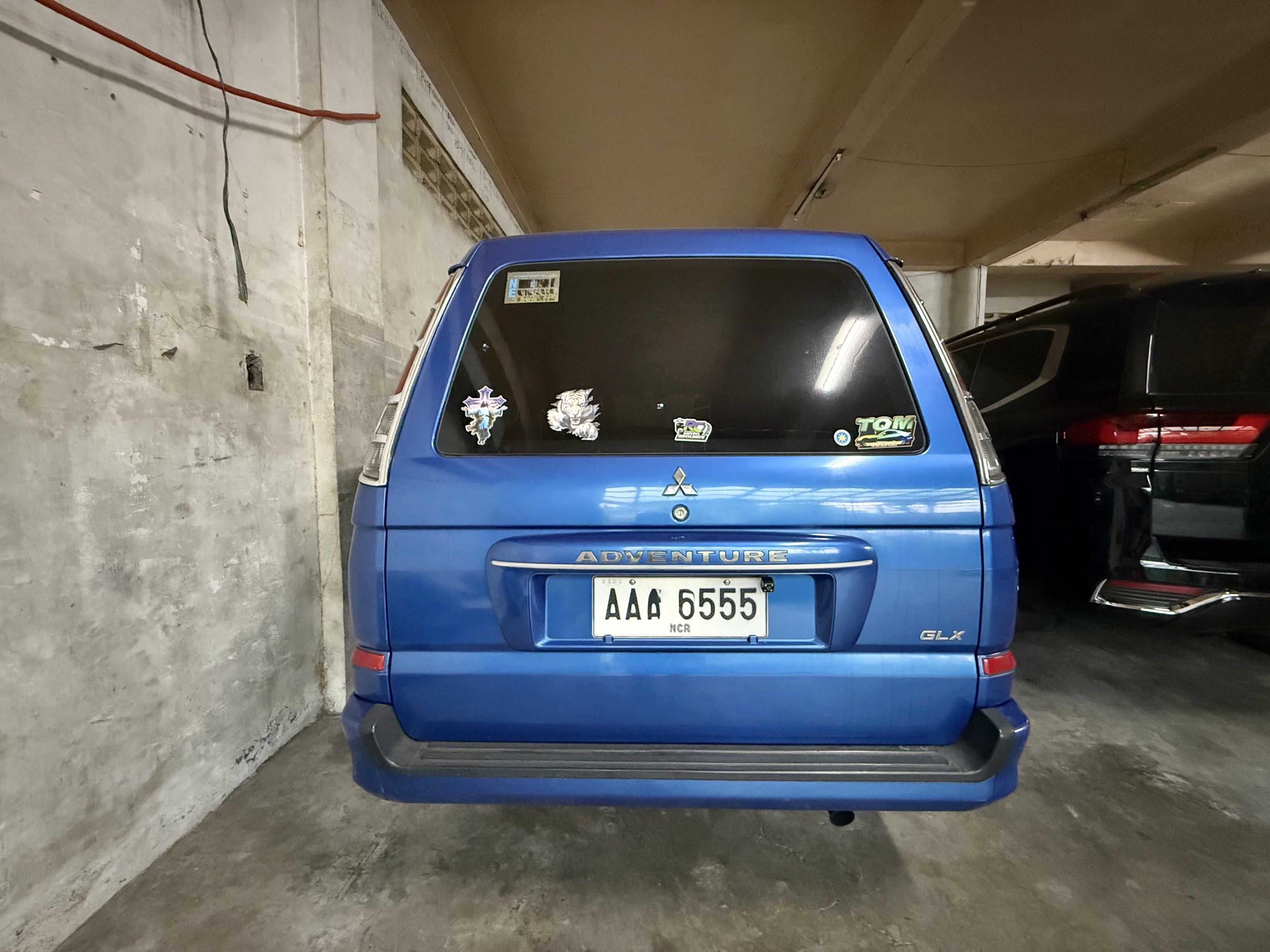 Mitsubishi Adventure GLX Manual (Category: Used Cars) located in Mandaluyong City. Submitted by miltsz (Listing ID 1418207875, Image 3). Description: 2014 Mitsubishi Adventure GLX M/T 118k kms Wed Coding Tested w/ long drives (was just driven to & from Isabela last Dec) - Upto date LTO Reg - With full comprehensive insurance upto this year - Regular PMS done at HMT Car Services QC (you can check w/ them, they have the full service records) - With