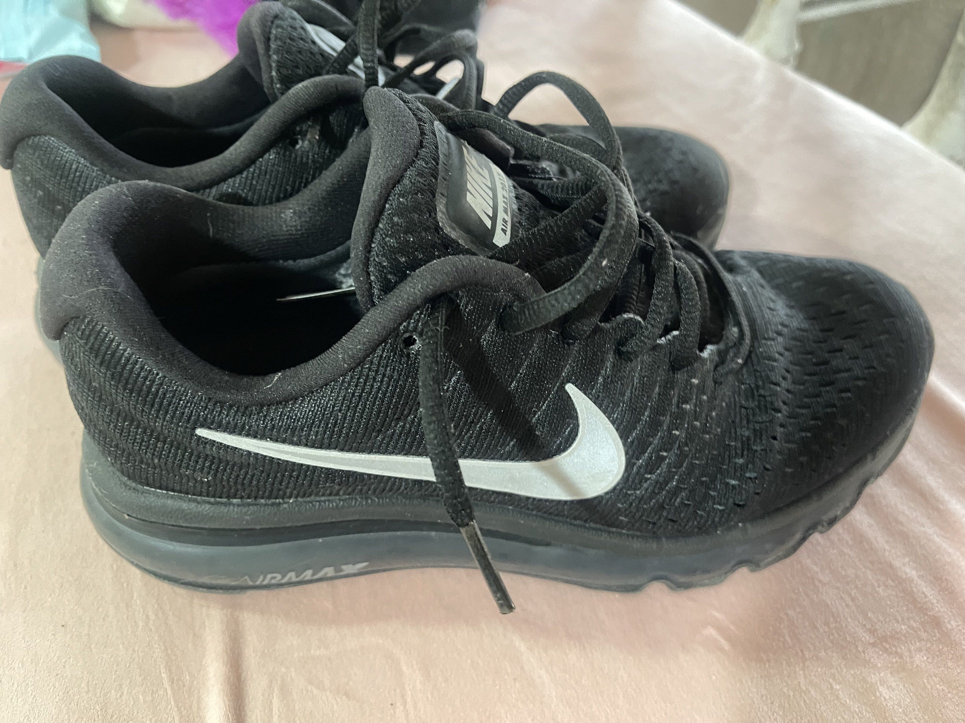 Nike Air Max Running Shoes (Category: Sneakers) located in Davao. Submitted by keylatates (Listing ID 1418205103, Image 1). Description: - declittering -with box Black Nike Air Max running shoes - Features Nike swoosh logo - Air Max logo visible on sole - Signs of wear on soles - Nike Running logo on insoles - Black laces included.