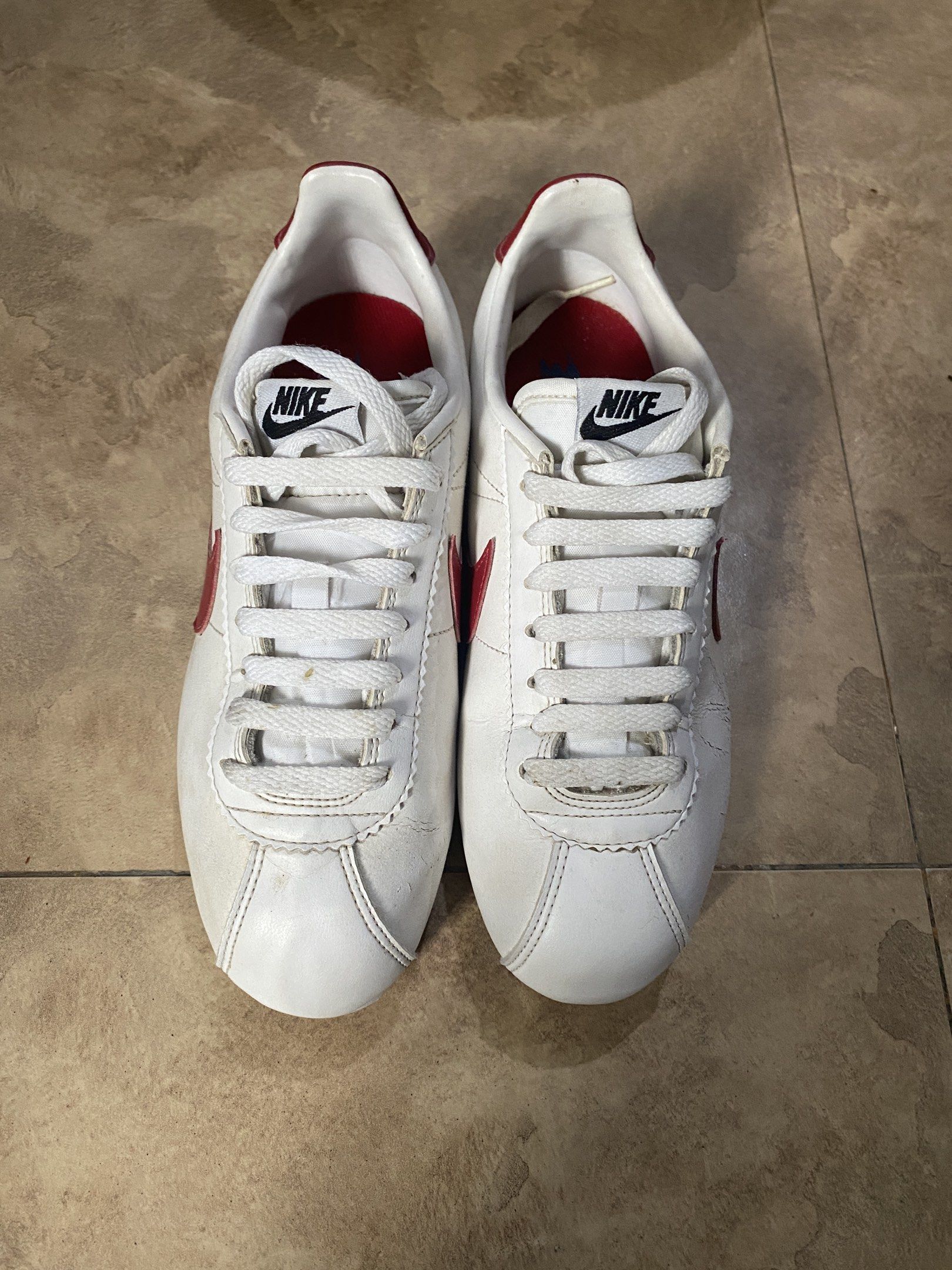 Nike Cortez White Red Blue Sneakers (Category: Sneakers) located in Santa Maria. Submitted by mbiancaserrano09 (Listing ID 1418203663, Image 1). Description: Lightly used pero nstock ng matagal so nagka creases na sya normal flaws ng mga leather nike shoes.