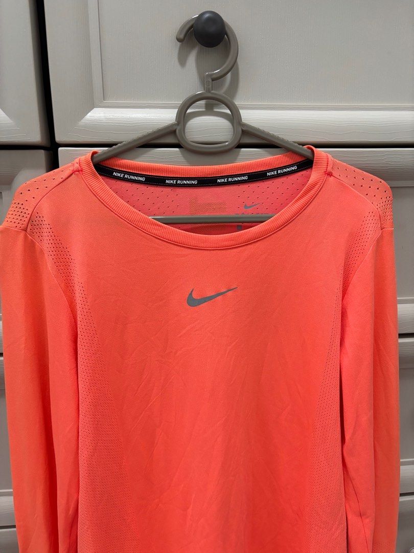Nike Dri-FIT Running Shirt - Orange (Category: Activewear) located in Baguio. Submitted by usedcondition (Listing ID 1418113447, Image 3). Description: .