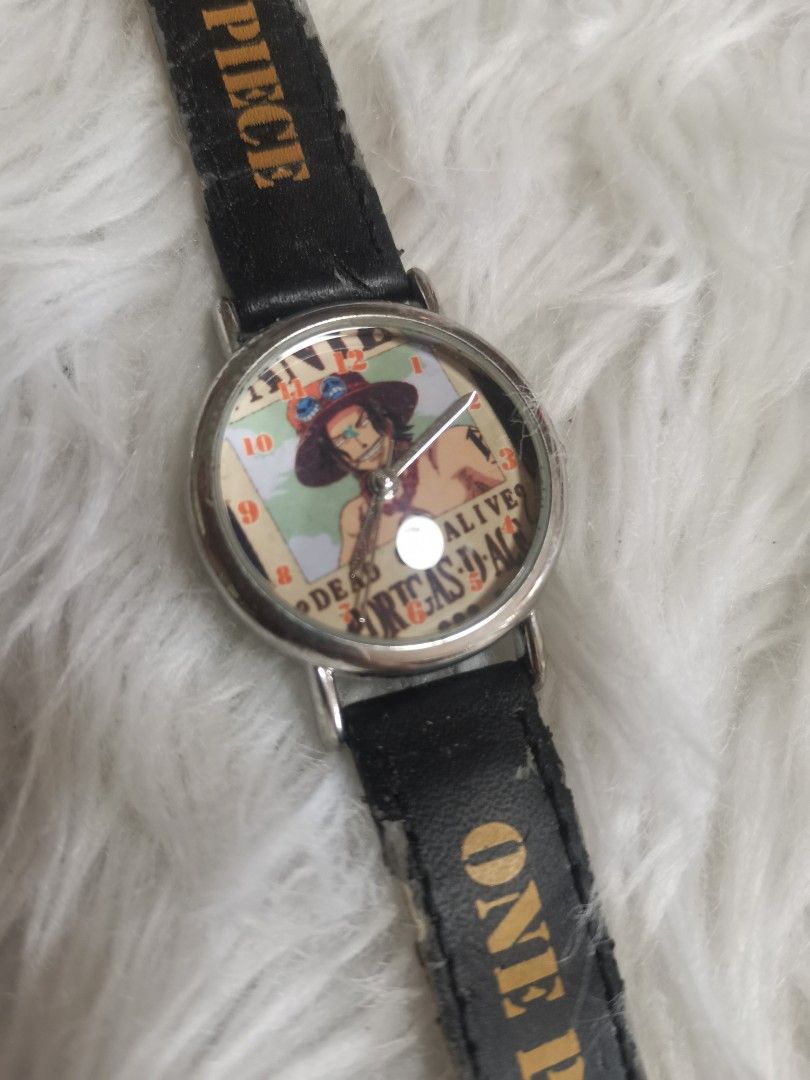 One Piece Ace Watch (Category: Men's Watches) located in General Mariano Alvarez. Submitted by ma.miafajardo1219 (Listing ID 1418077442, Image 1). Description: One Piece Ace Watch. Black strap with "ONE PIECE" print. Stainless steel back..