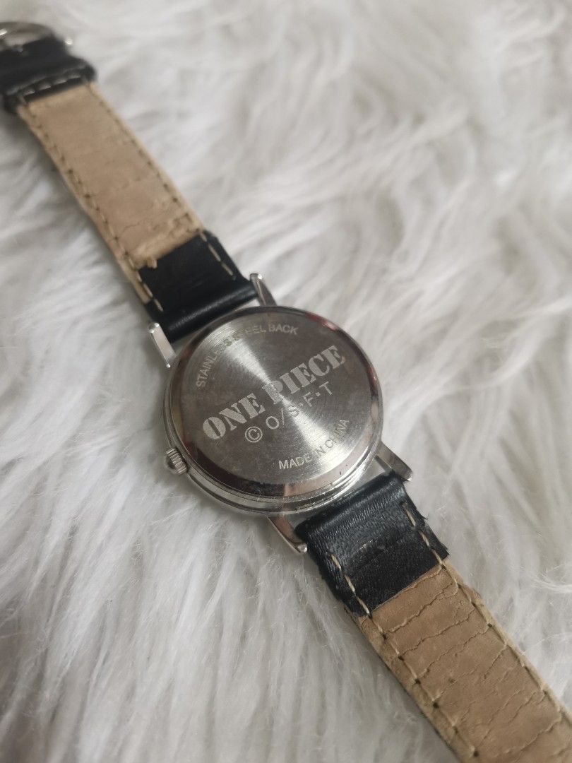 One Piece Ace Watch (Category: Men's Watches) located in General Mariano Alvarez. Submitted by ma.miafajardo1219 (Listing ID 1418077442, Image 3). Description: One Piece Ace Watch. Black strap with "ONE PIECE" print. Stainless steel back..