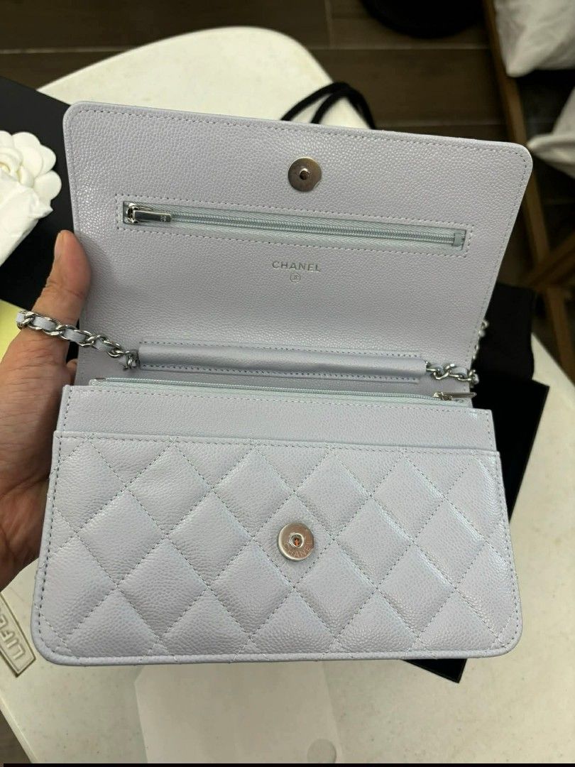 Original Chanel Wallet on Chain (Category: Luxury Bags & Wallets) located in Norzagaray. Submitted by roseannjoy29800 (Listing ID 1418032238, Image 2). Description: - Authentic Chanel Wallet on Chain - Light purple color - Classic quilted design - Silver chain strap - Interior with zippered compartment and card slots - Serial number visible - Includes original box and dust bag with receipt.
