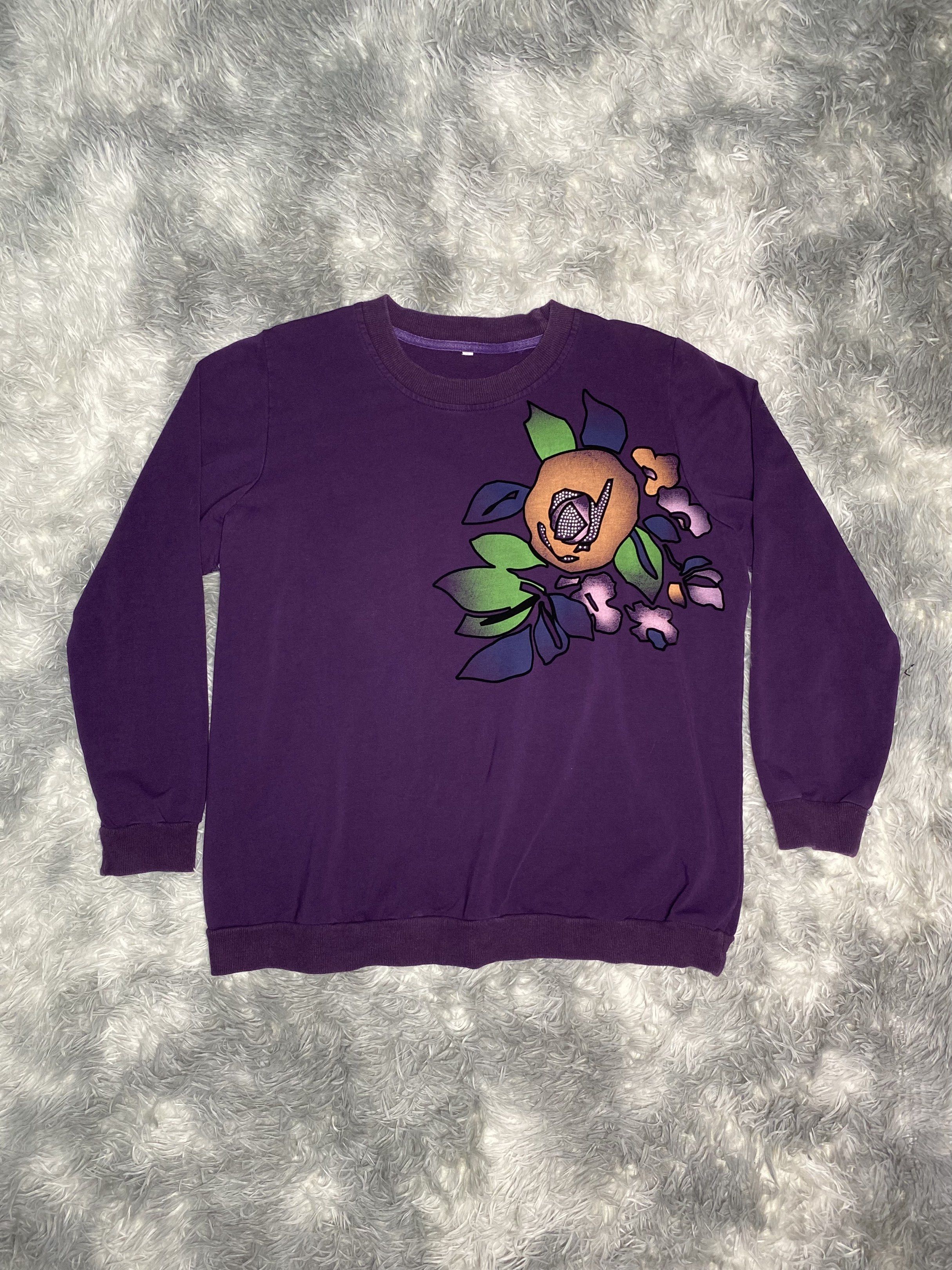 Purple Floral Graphic Sweatshirt (Category: Coats, Jackets and Outerwear) located in Manila. Submitted by dignthrift (Listing ID 1418143481, Image 2). Description: - Purple sweatshirt - Features a floral graphic - Size 3 - Measurements: 24 inches length, 22 inches chest - Long sleeves and crew neck - Comfortable fabric.