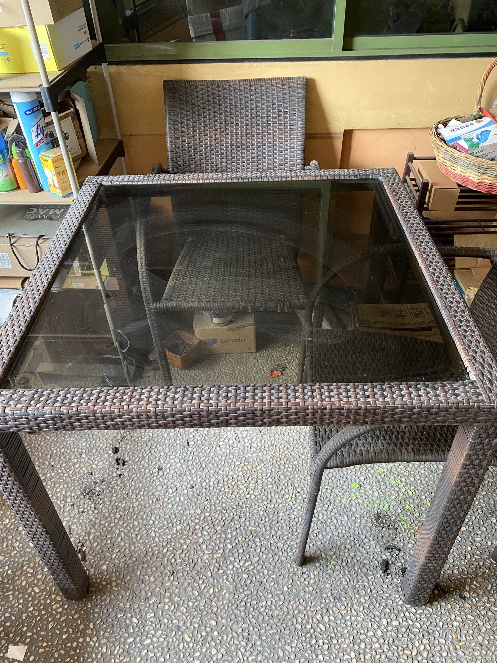Rattan plastic, Glass Table and Chairs Set (Category: Tables & Sets) located in Mandaluyong City. Submitted by mommykondo (Listing ID 1418102116, Image 2). Description: Plastic rattan garden set: Square table with tempered glass. Includes 4 matching chairs that need repair. Sturdy metal base. Table - 36 inches X 36 inches Height of table - 29 inches Chair height - 36 inches Width - 23 inches.