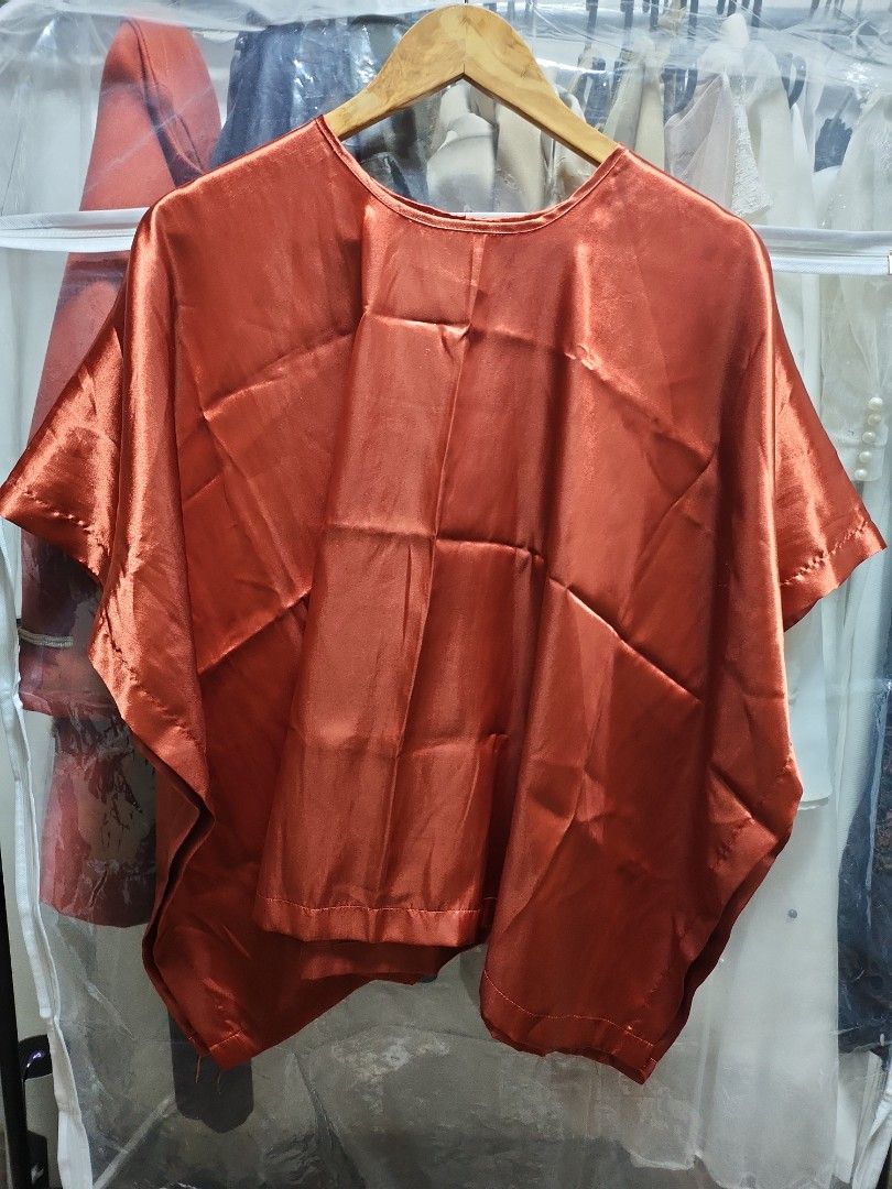 Rust satin nursing cover (Category: Maternity wear) located in Quezon City. Submitted by declttermum (Listing ID 1418112800, Image 1). Description: Preloved stylish rust satin nursing cover/poncho, free size. Can be used as top. Wysiwyg. #satinnursingcover #nursingcover #nursingponcho.