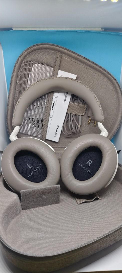 Sennheiser Momentum 4 Wireless Headphones (Category: Headphones & Headsets) located in Mandaue City. Submitted by aaghub (Listing ID 1418114775, Image 1). Description: - Sennheiser Momentum 4 Wireless Headphones - Neutral color - Includes original case, charging cable, and documentation - Earcups marked 'L' and 'R' - Padded headband and earcups for comfort - Matching color case with zippered closure 🚨 1 STOCK ONLY | Sennheiser Momentum 4 🚨 🎧 P