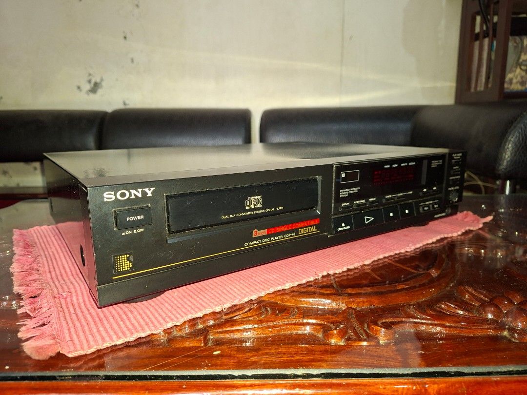 Sony CDP 48 CD Player (Category: Soundbars, Speakers & Amplifiers) located in Bulacan. Submitted by sweet_spot09 (Listing ID 1418014477, Image 3). Description: Compact Disc Player 3" CD Single Compatible Dual D/A Converter System Digital display/ Filter RCA Audio output ports Black finish with gold accents 120v/60Hz 12w Made in Japan.