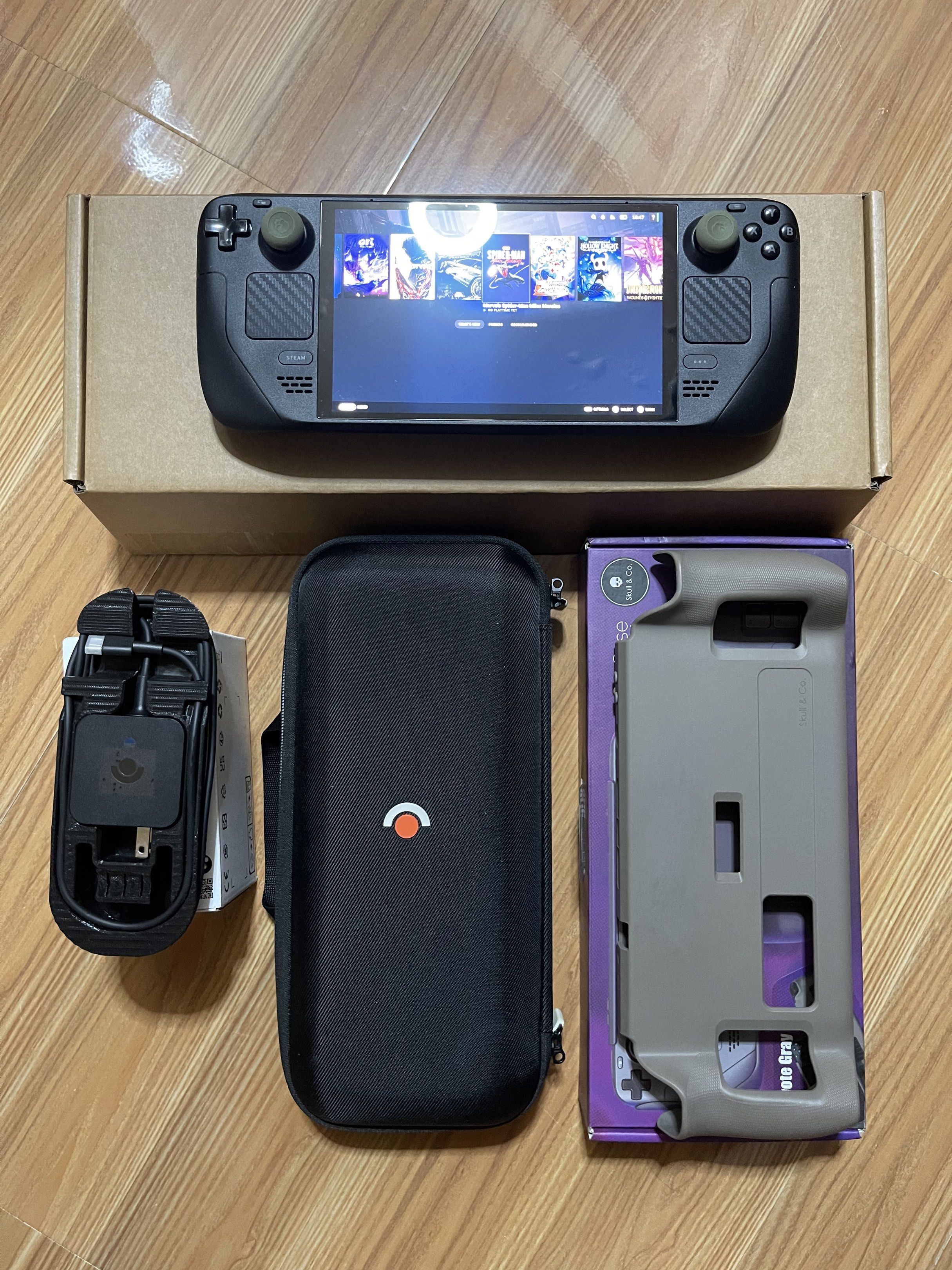 Steamdeck OLED 1tb (512ssd+512sd) (Category: Others) located in Valenzuela. Submitted by amdps (Listing ID 1418168057, Image 1). Description: STEAMDECK OLED 1TB 512SSD + 512SD with Pouch Bag with Grip Case with Charger.