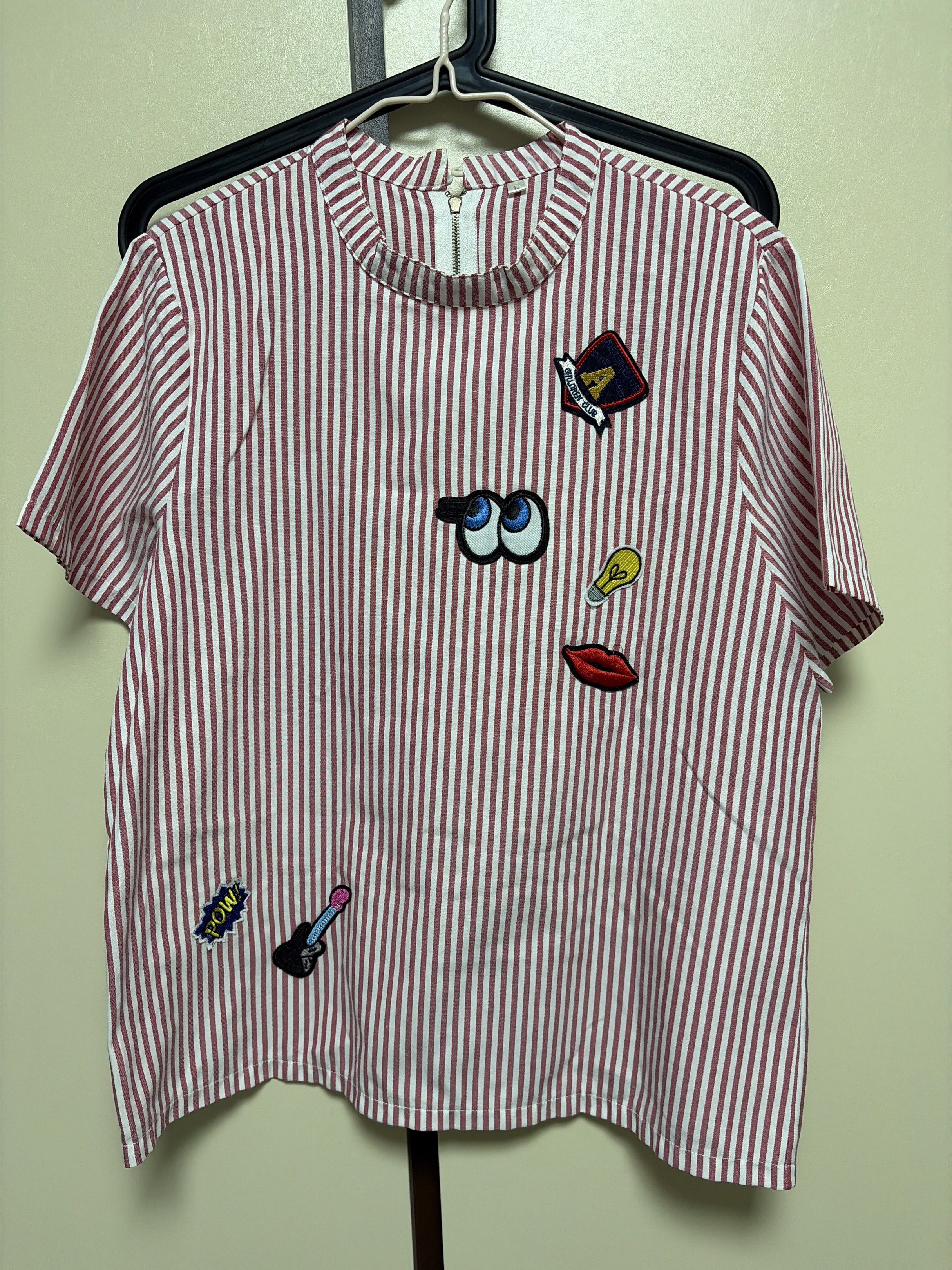 Striped Patchwork Top (Category: Blouses) located in Singapore. Submitted by missydj (Listing ID 1418116847, Image 1). Description: Ptp 48cm, L 64cm - Unique striped top - Fun patchwork details - Round neckline with zipper - Perfect for casual wear.