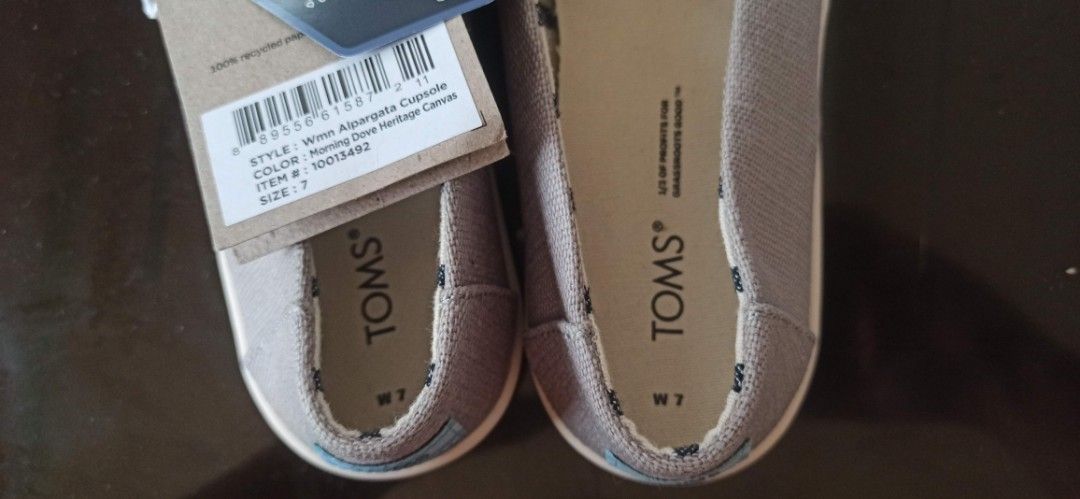 TOMS Women's (Category: Loafers) located in Santa Teresita. Submitted by icecandy2.0 (Listing ID 1418061980, Image 2). Description: - Brand new TOMS Alpargata Heritage Canvas shoes - Gray canvas upper - Striped interior lining - Comfortable slip-on design - Classic white sole - Size: 7 - Includes original tags.