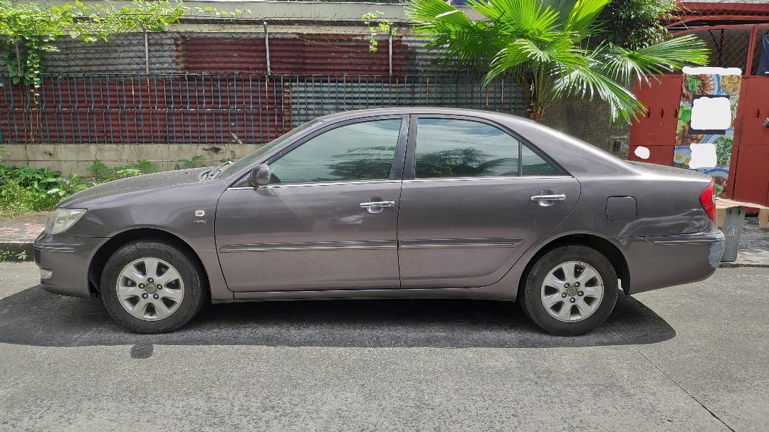 Toyota Camry 2.4 (A) (Category: Used Cars) located in Quezon City. Submitted by bennyhjc (Listing ID 1418113617, Image 2). Description: - First owner - Engine in great condition - Cold air-conditioner - Newly registered (Jan. 2026) - Newly maintained and ready to use - Monday coding RFS: need parking space 09173096245.