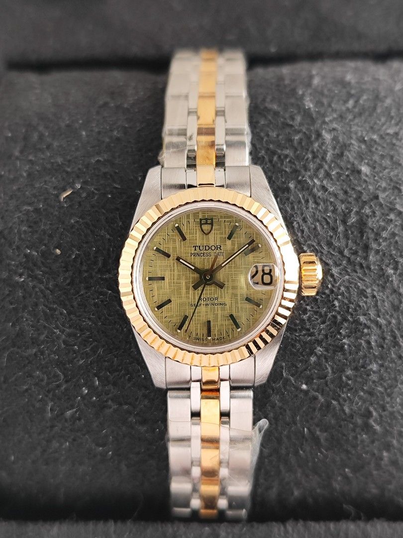 Tudor Princess Date 24mm (Category: Luxury Watches) located in San Juan City. Submitted by MW_888 (Listing ID 1418152963, Image 2). Description: Tudor Princess Date 24mm Linen dial, two tone fluted solid gold bezel and inner links Ref 92513 H serial, 2000 9.3/10 condition Inclusions: watch, original bracelet fit to approx 6.8" wrist, hangtag with matching serial / refer number and watch pouch *watch can pass new old stock, see photo of jubilee br