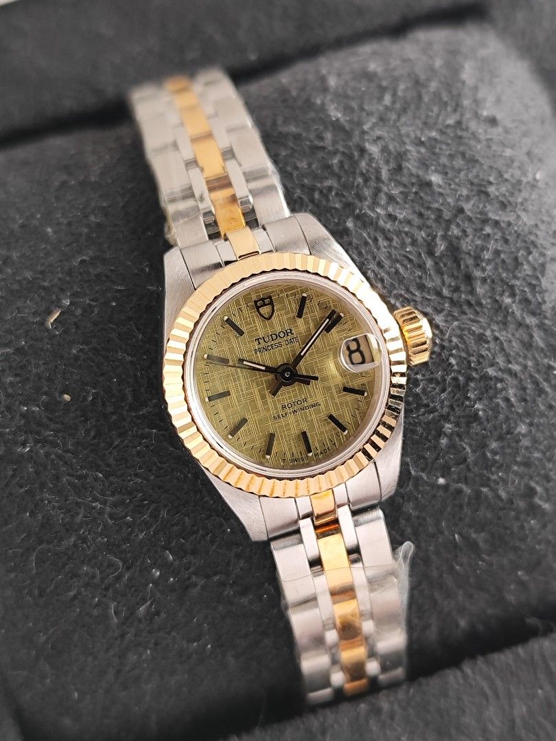 Tudor Princess Date 24mm (Category: Luxury Watches) located in San Juan City. Submitted by MW_888 (Listing ID 1418152963, Image 3). Description: Tudor Princess Date 24mm Linen dial, two tone fluted solid gold bezel and inner links Ref 92513 H serial, 2000 9.3/10 condition Inclusions: watch, original bracelet fit to approx 6.8" wrist, hangtag with matching serial / refer number and watch pouch *watch can pass new old stock, see photo of jubilee br