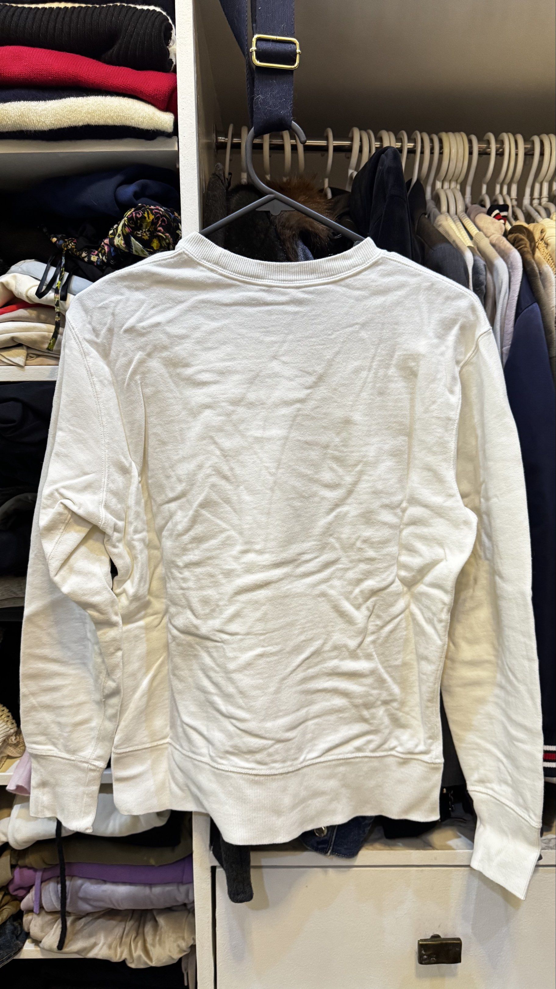 Uniqlo UT KAWS Peanuts Sweatshirt (Category: Coats, Jackets and Outerwear) located in Mandaluyong City. Submitted by prelovedcole (Listing ID 1418148020, Image 2). Description: Uniqlo UT KAWS Peanuts sweatshirt. Size S. Made in China. Crew neck, long sleeves. Small embroidered front design..