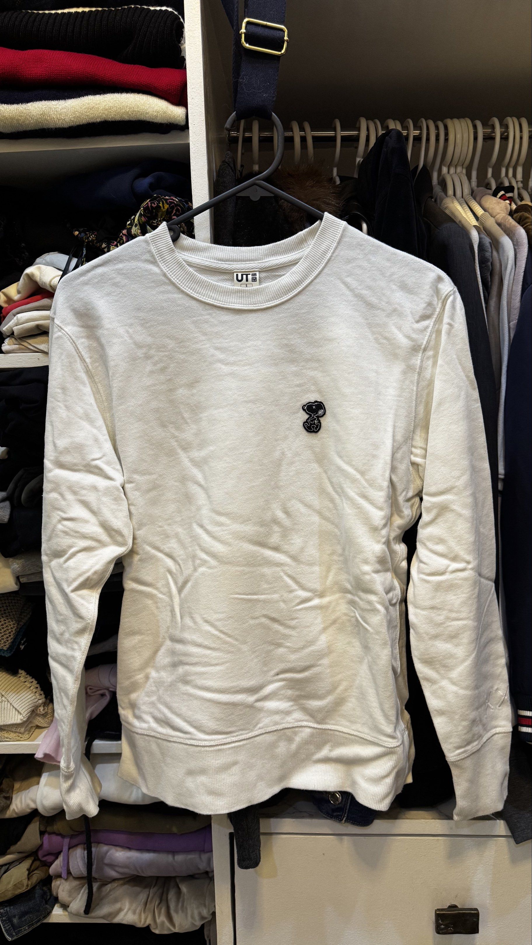Uniqlo UT KAWS Peanuts Sweatshirt (Category: Coats, Jackets and Outerwear) located in Mandaluyong City. Submitted by prelovedcole (Listing ID 1418148020, Image 1). Description: Uniqlo UT KAWS Peanuts sweatshirt. Size S. Made in China. Crew neck, long sleeves. Small embroidered front design..