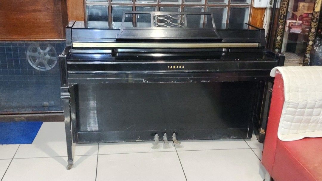 Yamaha Spinet Piano (Category: Musical Instruments) located in Manila. Submitted by binbot (Listing ID 1418070972, Image 2). Description: - Yamaha spinet piano - Full keyboard with white and black keys - Includes music stand - Three pedals - Well-maintained, glossy black finish RFS: migrating.