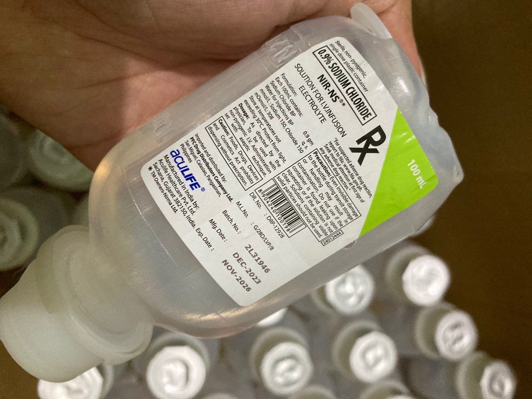 AcuLife 0.9% Sodium Chloride Solution 100ml (100pcs) (Category: Body Care) located in Dasmarinas. Submitted by _decluttercorner (Listing ID 1418347112, Image 1). Description: - AcuLife 0.9% Sodium Chloride solution for IV infusion. - Each 100ml contains 0.9 gm Sodium Chloride BP. - Sterile and non-pyrogenic. - Expiry Date: November 2026. - Manufactured by AcuLife Healthcare Pvt. Ltd. (India). - Storage: Store below 30°C. Protect from light..