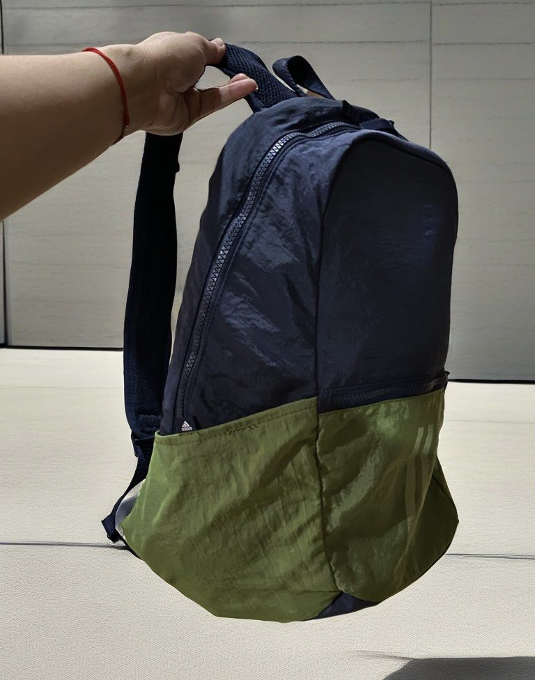 🔥 Adidas Backpack - Unisex (Category: Backpacks) located in Cebu City. Submitted by kantocloset_ubec (Listing ID 1418330074, Image 3). Description: - Adidas backpack in black and army green. - Includes a main compartment, side pockets and adjustable straps. - Good condition - No flaws - Actual item shown .
