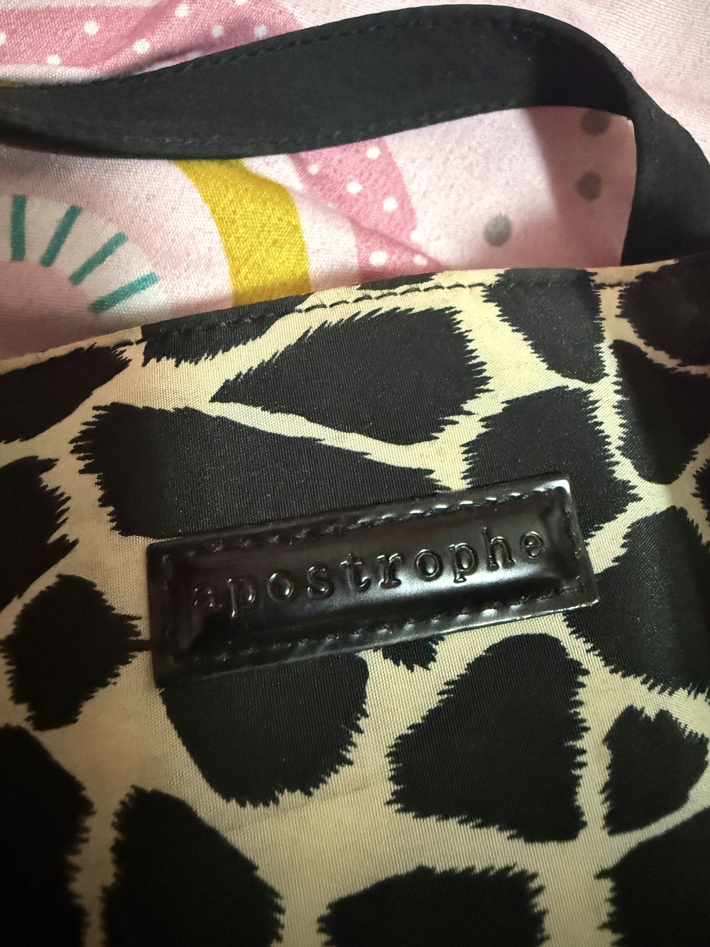 APOSTROPHE SHOULDER BAG (ANIMAL PRINT) (Category: Shoulder Bags) located in Quezon City. Submitted by frannecess (Listing ID 1418365127, Image 3). Description: 🌸FOR SALE🌸 APOSTROPHE SHOULDER BAG (ANIMAL PRINT) Personal favorite Kasya ipad 10th Snap button Condition: 8/10 Loc: Pasong Tamo Quezon City.