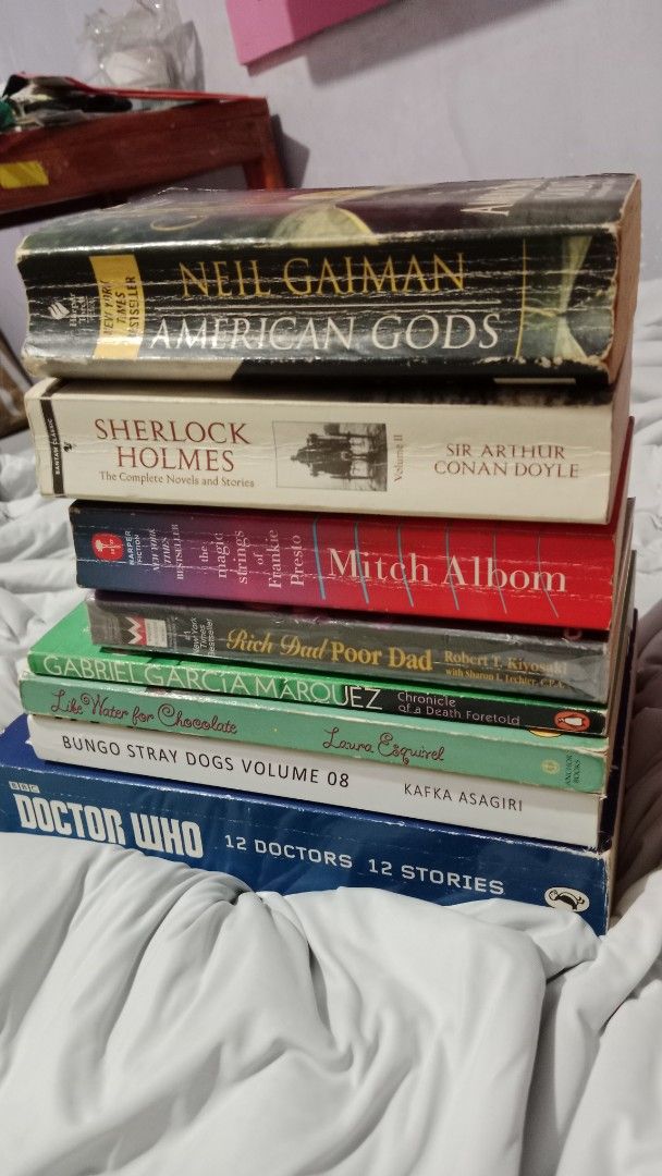 Assorted Books - TAKE ALL (Category: Storybooks) located in Manila. Submitted by nachobebi (Listing ID 1418334200, Image 1). Description: - TAKE ALL: P650 No barat. - SOLD - Like Water for Chocolate - Check my profile listings for individual book prices. - Includes: Doctor Who, BSD - Stormbringer, Chronicle of a Death Foretold, Rich Dad Poor Dad, The Magic Strings of Frankie Presto, Sherlock Holmes Volume II, American Gods - RFS: Decluttering.