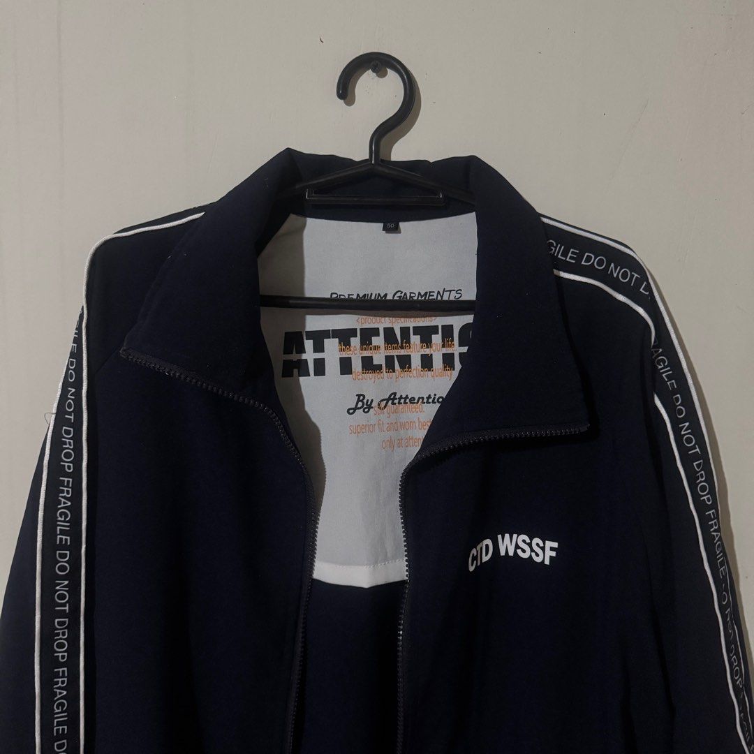 attention premium garments jacket (Category: Coats, Jackets and Outerwear) located in Manila. Submitted by renjuner (Listing ID 1418306651, Image 2). Description: navy blue jacket with white accents full zipper, white stripe sleeves missing zip guagua, pampanga gcash, j&t.