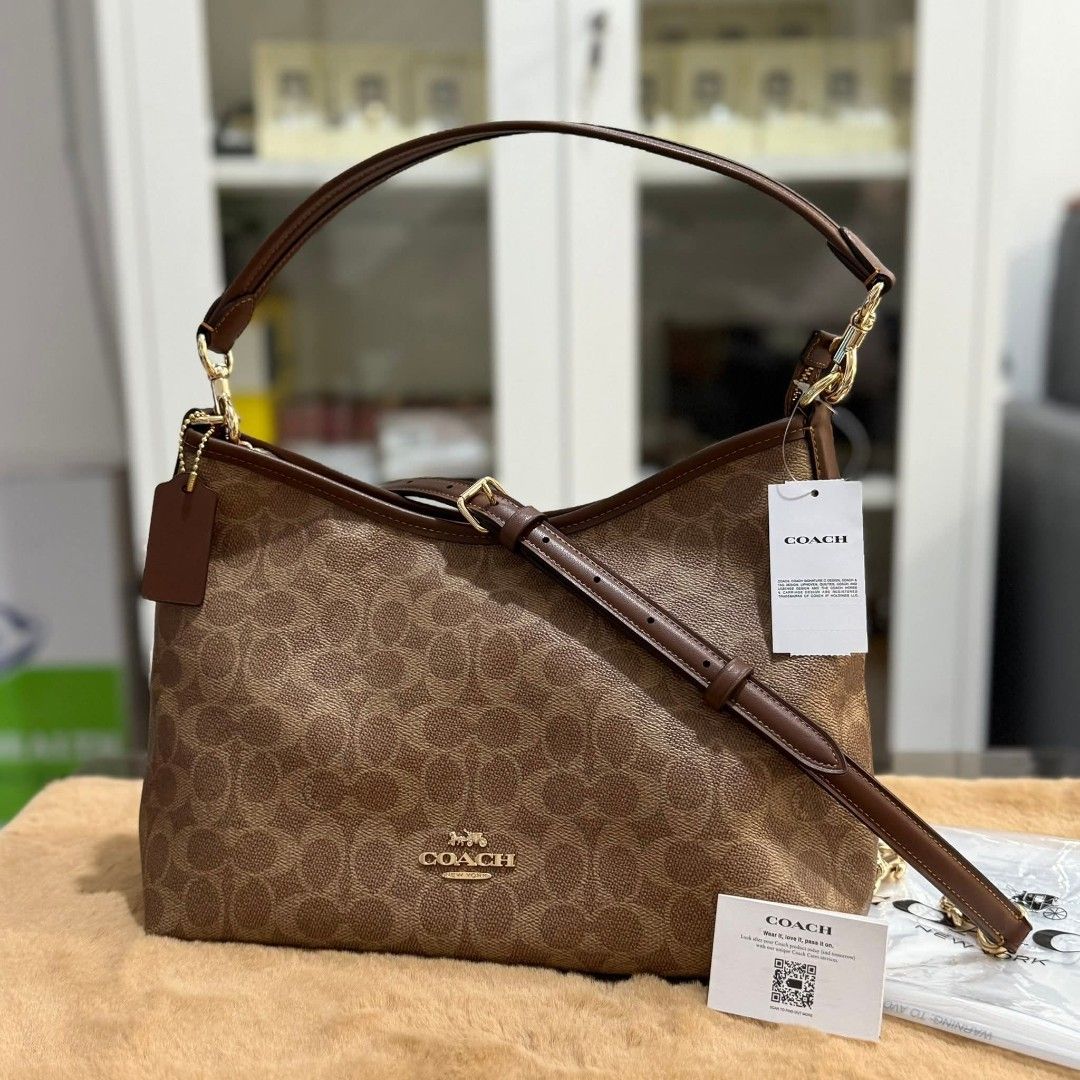 💯🇨🇦Authentic Coach Laurel Two-Way Bag (Category: Luxury Bags & Wallets) located in San Pedro. Submitted by powlah (Listing ID 1418366924, Image 1). Description: 💯💯🇨🇦Original & Brandnew Coach Laurel Two-Way Bag ✅SALE: ₱9,599 only! ❌Mall Price: ₱23,207 ✅️Brandnew with tag, cc and polyplastic ✅️With free Coach Dustbag 😍 ✅️With two detachable slings ✔️Can be shoulder bag ✔️Can be sling bag Length: 12.25" Height: 9.25" Width: 4.25" ✨️Signature