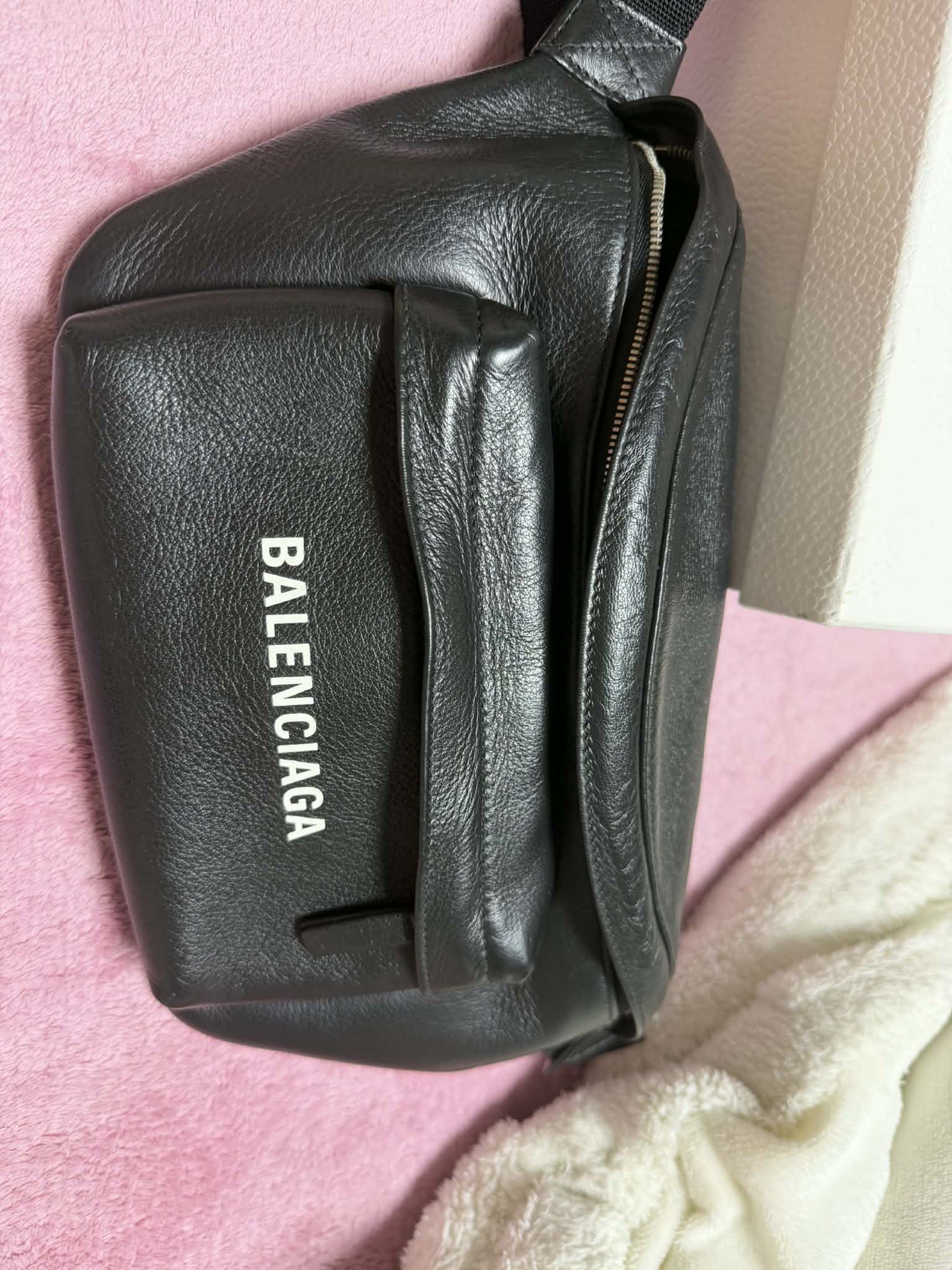 Balenciaga Leather belt Bag (Category: Luxury Bags & Wallets) located in Angeles City. Submitted by thrifted.cl (Listing ID 1418271990, Image 2). Description: - Balenciaga black leather waist bag - Front pocket with Balenciaga logo - Zipper closure - Adjustable strap - condition 9/10 Nasa dubai yung bag, if sure buyer can deliver via lbc (1week eta) .