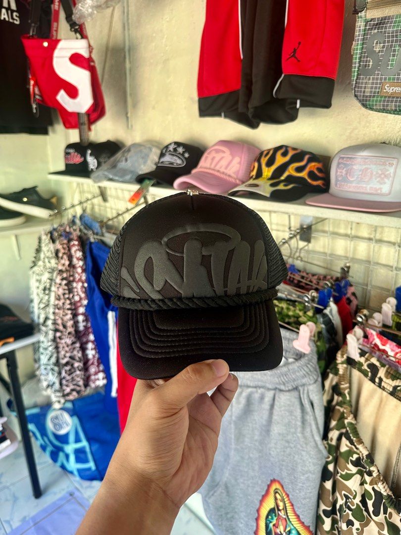 Black Cap with Text (Category: Caps & Hats) located in Cavite. Submitted by teamhd (Listing ID 1418289753, Image 1). Description: - Black cap - Mesh back for breathability - Curved brim - Raised text detail - Rope detail above brim - Stylish design.