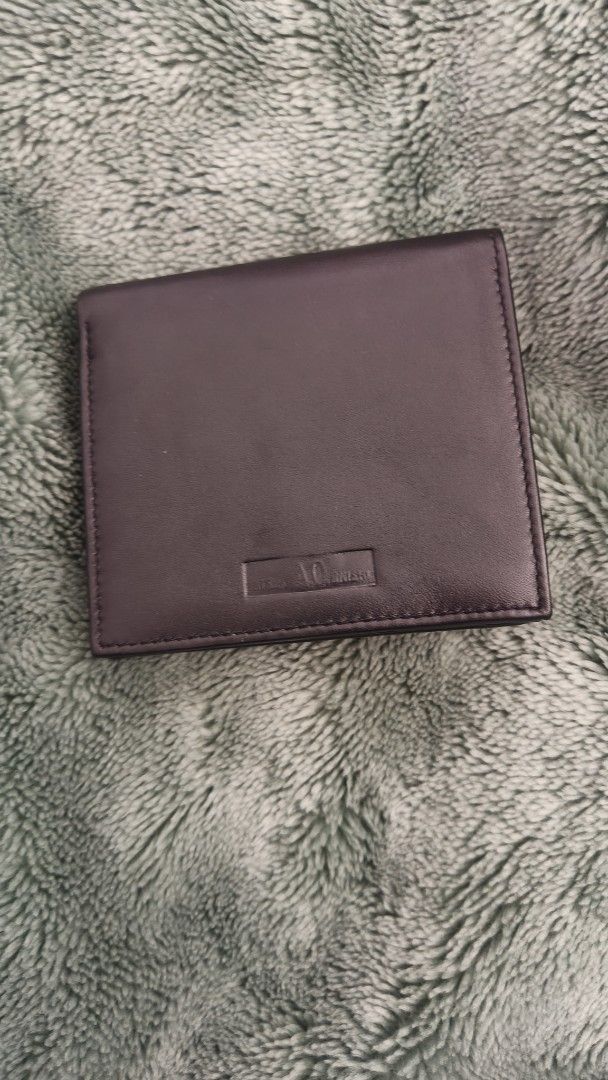 Black Leather Wallet (Category: Wallets & Card holders) located in Tanza. Submitted by declutterolshoppe (Listing ID 1418251350, Image 1). Description: - Black leather wallet - Multiple card slots - Clear ID window - Secure snap closure - Smooth leather - Simple, classic design - Ideal for daily use - Compartments for cards and cash.