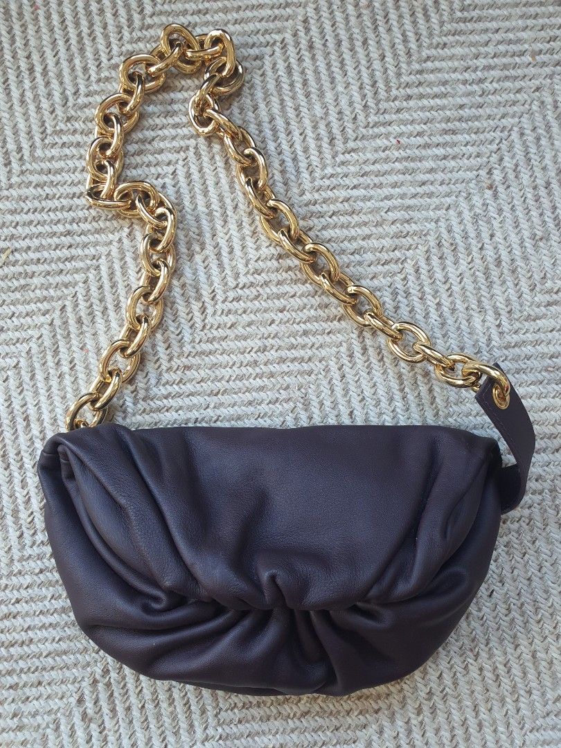 Bottega Veneta Chain Pouch Bag (Category: Luxury Bags & Wallets) located in Cagayan de Oro. Submitted by real_luxe (Listing ID 1418233636, Image 1). Description: Bottega Veneta Chain Pouch bag - Design: Ruched - Strap: Gold chain - Made in Italy - serial number.