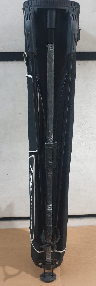 Champkey Golf Stand Bag (Category: Golf) located in Pasay City. Submitted by jen.pen (Listing ID 1418228177, Image 2). Description: - Champkey golf stand bag - Stand mechanism for easy setup - Convenient carrying handle - Stylish white trim - Side pocket for storage - Champkey logo displayed.