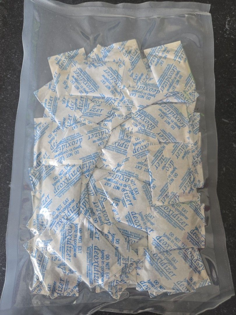 Deoxidizer Packets - New (Category: Other Food & Drinks) located in Singapore. Submitted by smilejean (Listing ID 1418220607, Image 1). Description: - Sealed deoxidizer packets - Prevents oxidation - Each packet labeled 'deoxidizer' and 'do not eat' - Best stored in a container - Ideal for storage and preservation.