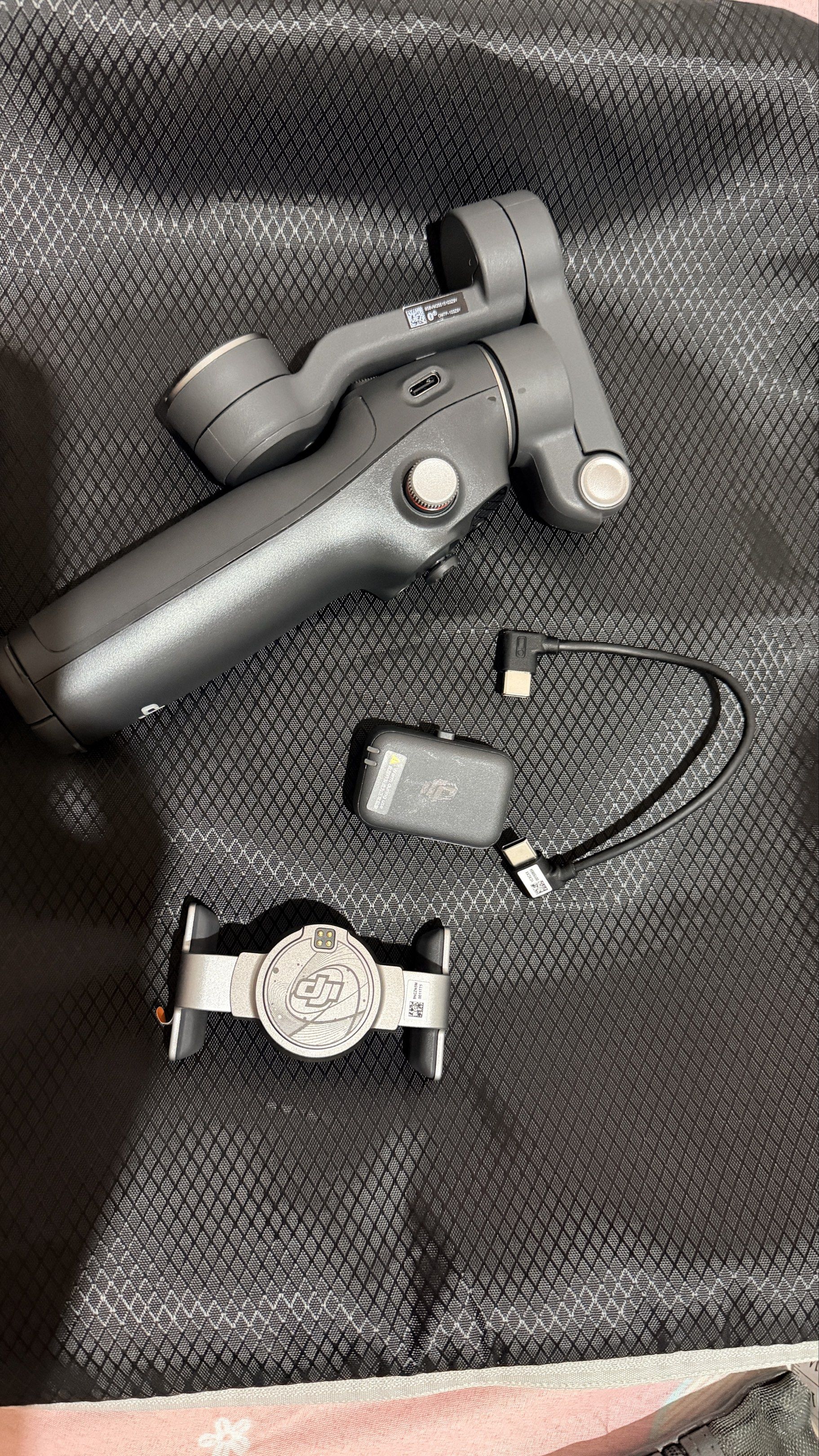 DJI Osmo Mobile 7P Smartphone Stabilizer (Category: Gimbals & Stabilizers ) located in Manila. Submitted by casayuranhannahmae.1 (Listing ID 1418285796, Image 3). Description: - DJI Osmo Mobile 7P smartphone stabilizer - Designed for iPhone - Includes: Stabilizer, charging cable, phone mount, and box - Features control buttons - USB-C port - SRP: 7,499 RFS: I haven’t used this—only opened it to check the inside and tried it once on my phone. I’m 