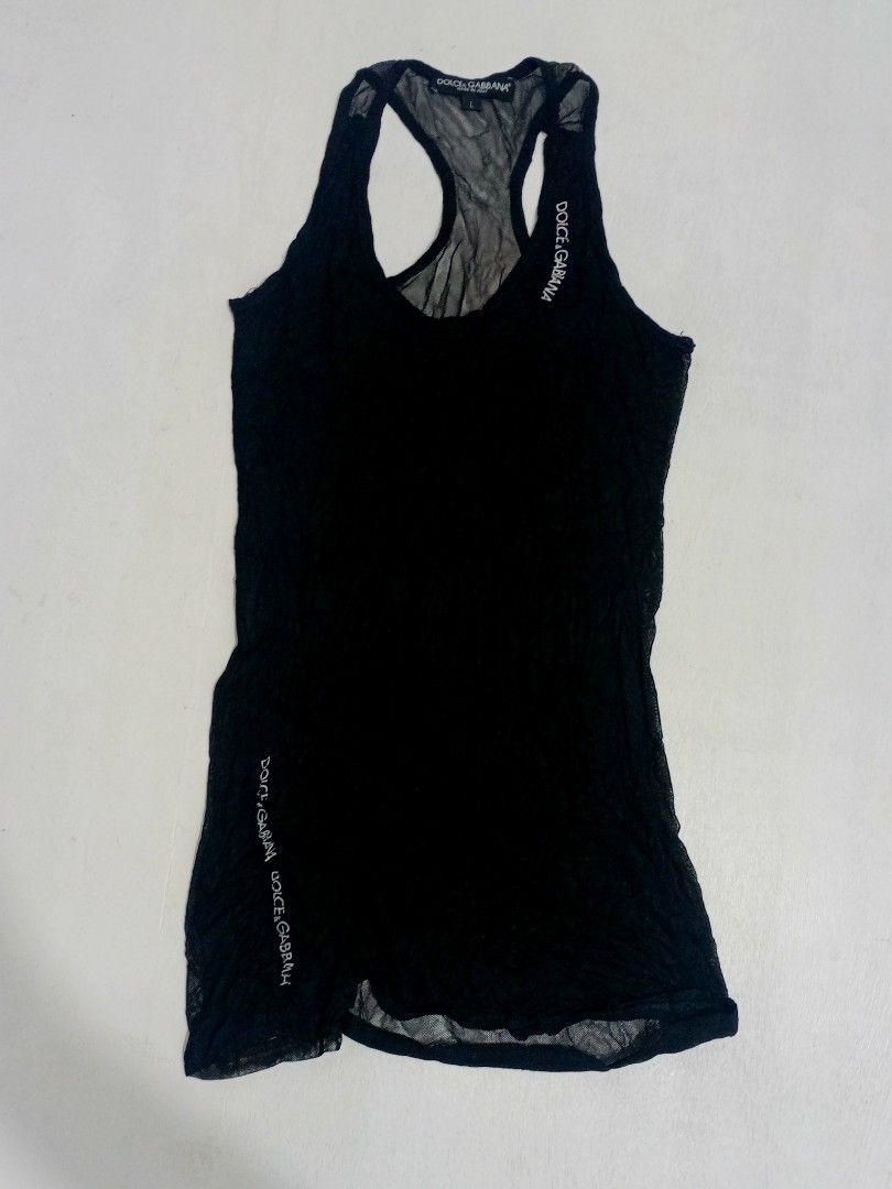 Dolce & Gabbana Black Tank Top (Category: Luxury Apparel) located in Navotas City. Submitted by riyuwi (Listing ID 1418398639, Image 2). Description: PreOWNED LIKENEW Lightly Used D& G WOMANS TANK TOPS BLACK Size Small -Medium Sheer at the back Embroidee logo Stretch Good Condition 9/10.