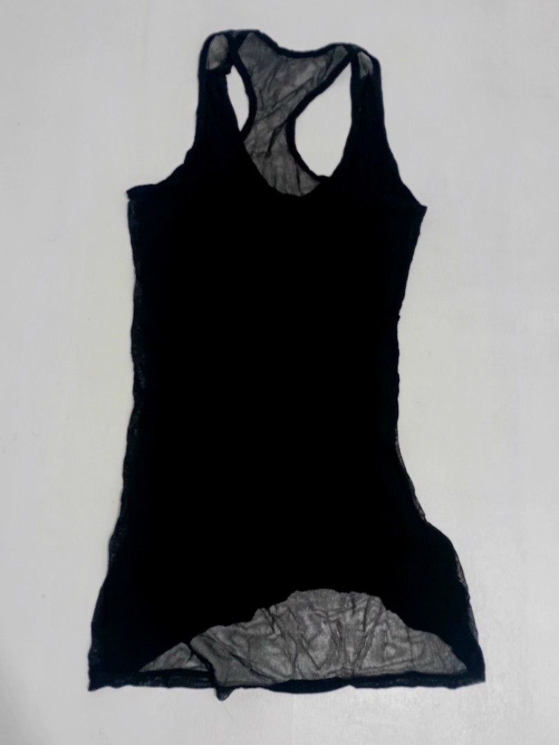 Dolce & Gabbana Racerback Black Tank Top (Category: Luxury Apparel) located in Manila. Submitted by eriiicaspage (Listing ID 1418297028, Image 2). Description: PreOwned ,likeNew Lightly Used Dolce & Gabbana tank top -XS-Small - Black color - Racerback design - Features brand logo - Sheer,at the back - lightweight fabric - Scoop neck Off/legit. No guaranty sa Authenticity Good Condition 9/10.