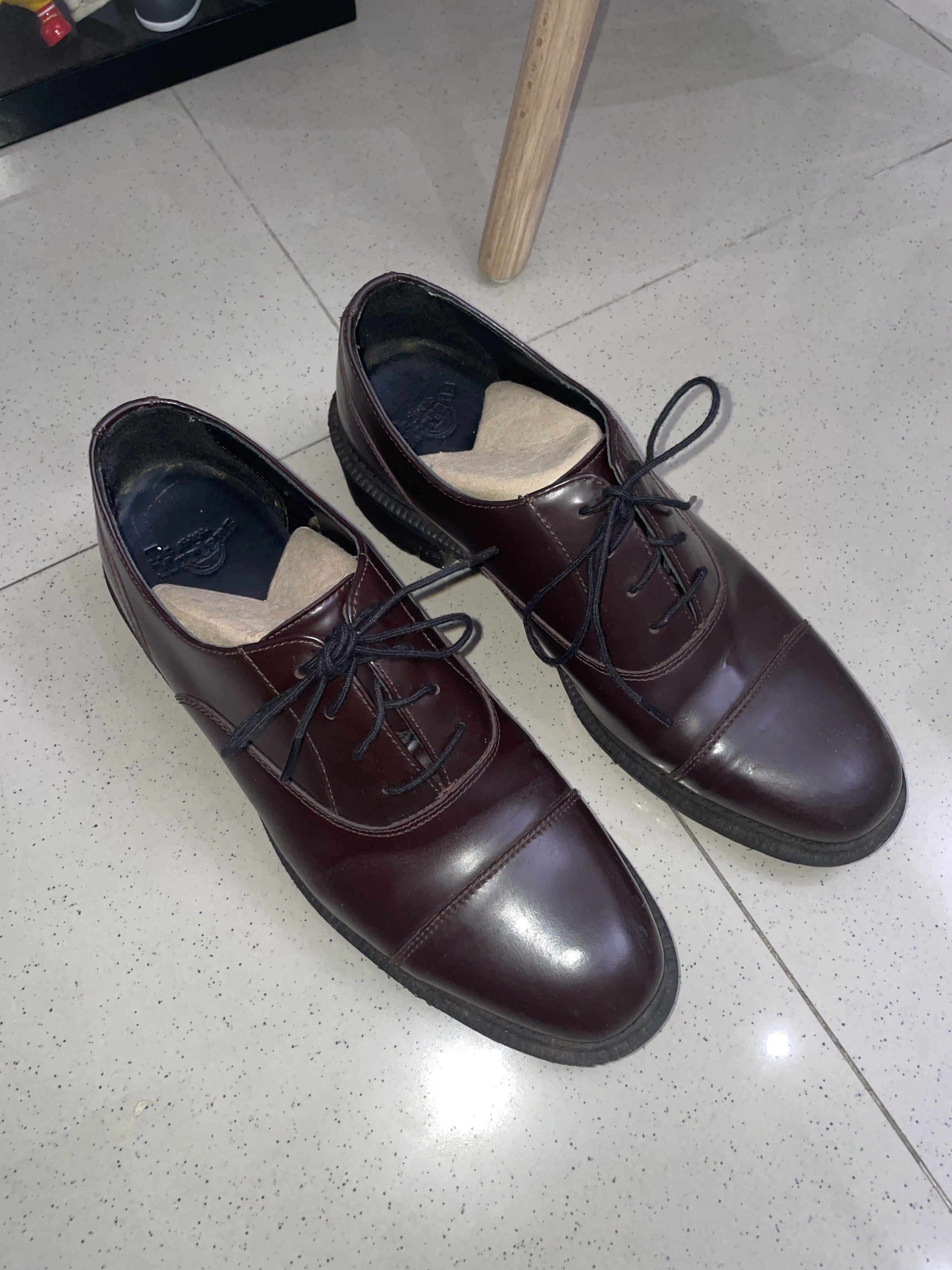 Dr. Martens Oxford Shoes (Category: Loafers) located in Manila. Submitted by fionnasams84058 (Listing ID 1418343971, Image 2). Description: - Classic Dr. Martens Oxford shoes - Rich brown color - Iconic Dr. Martens sole - Leather upper - Laces included - Insoles present - Soles show little wear - Well-maintained.
