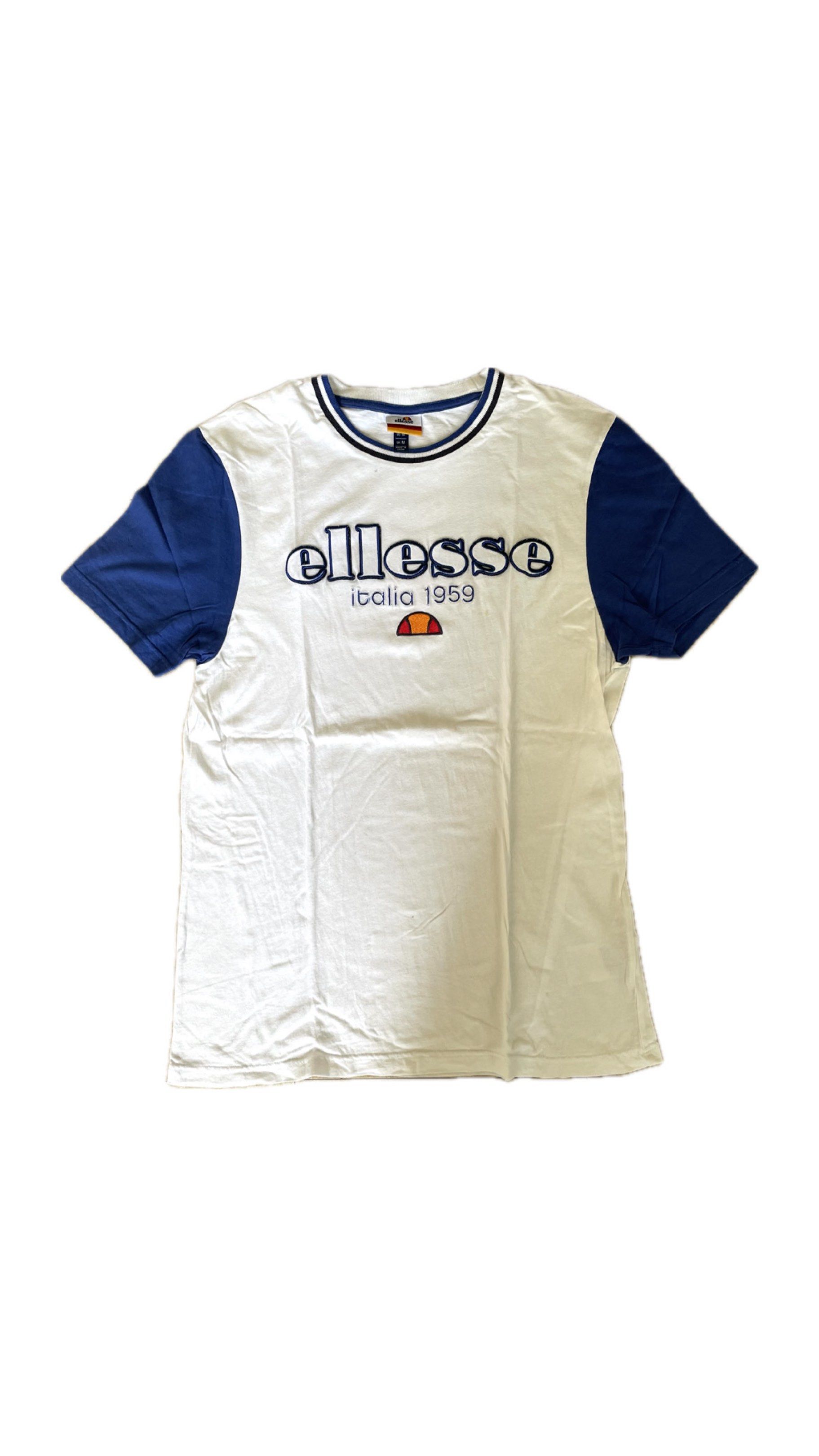 Ellesse Italia T-shirt (Category: Tshirts & Polo Shirts ) located in Manila. Submitted by wavy.scentss (Listing ID 1418281011, Image 1). Description: ✧ Very Good Condition ✔️ Gcash/Maya payment only (Cash for meet ups only) ✔️ PAY AS YOU ORDER or PAY BEFORE SHIPMENT 📍MANILA - QC - Ellesse T-shirt - Size: M - Color: White with blue accents - Features the "ellesse italia 1959" logo - Crew neck with blue and white stripes - Blue sleeves - Plain whi