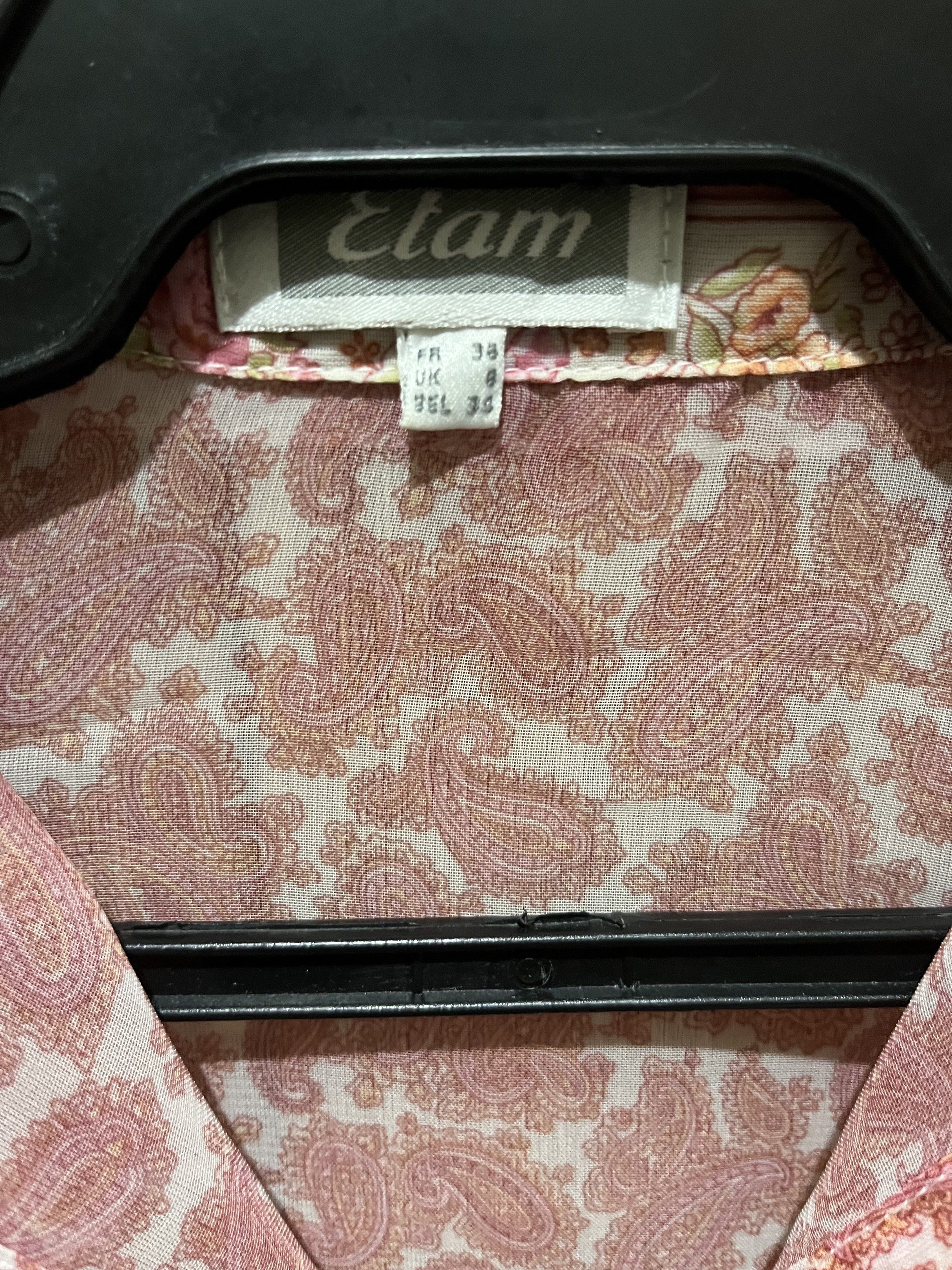 Etam Floral Paisley Print Button Down Blouse (Category: Blouses) located in Mandaluyong City. Submitted by from.soph (Listing ID 1418392377, Image 2). Description: - no flaws - sheer - fits s-m MoP: GCash, Maya, GoTyme, BDO MoD: Grab, Lalamove, GoGo Xpress, LBC (shouldered by buyer) DM for inquiries or more photos .