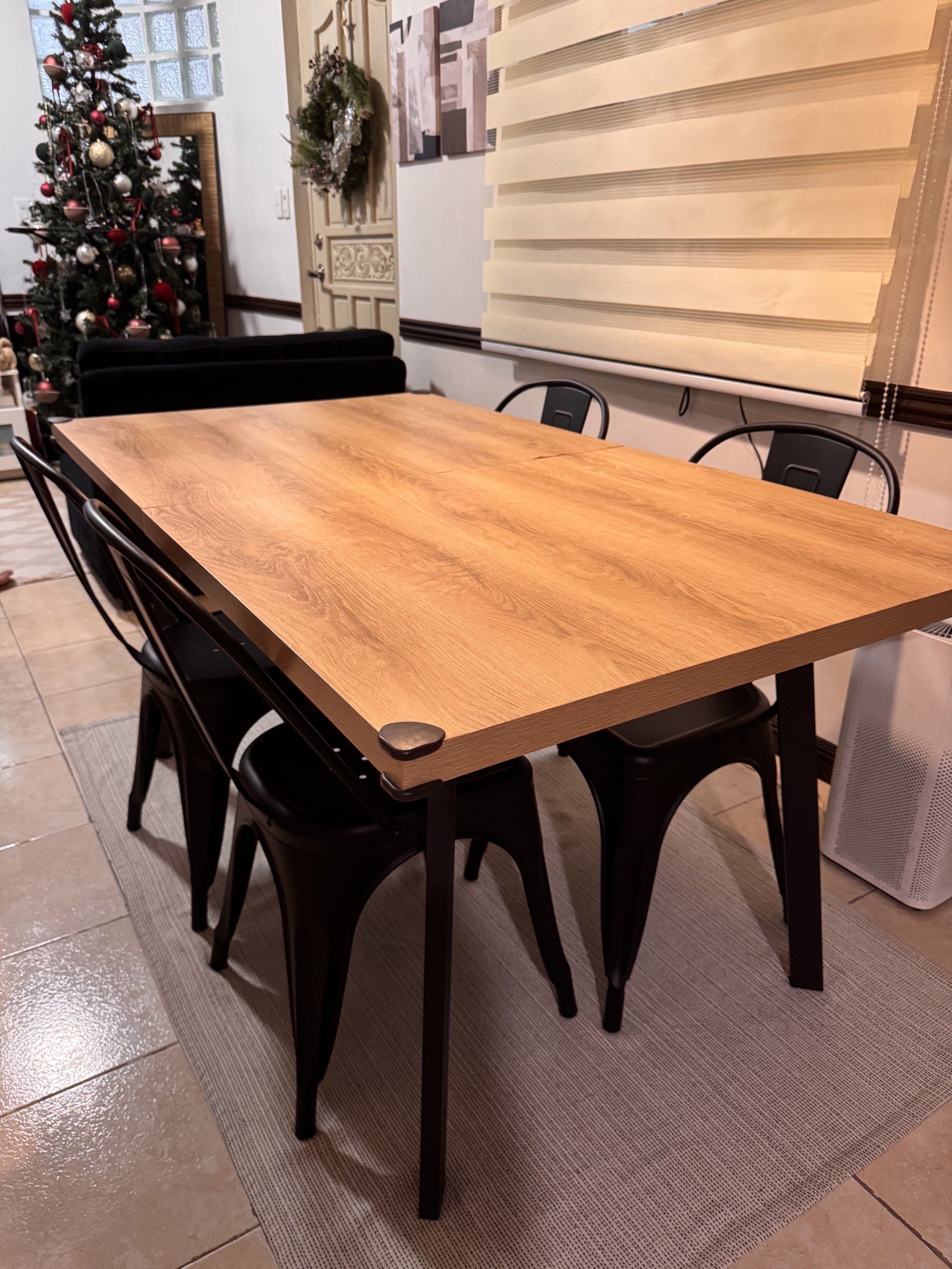 Extendable Dining Table with 4 Chairs (Category: Tables & Sets) located in Quezon City. Submitted by mnikavllnv (Listing ID 1418356573, Image 2). Description: - Extendable dining table - Includes four black tolix metal chairs - Sturdy metal frame - Ideal for modern dining areas Loyola heights qc pick up area.