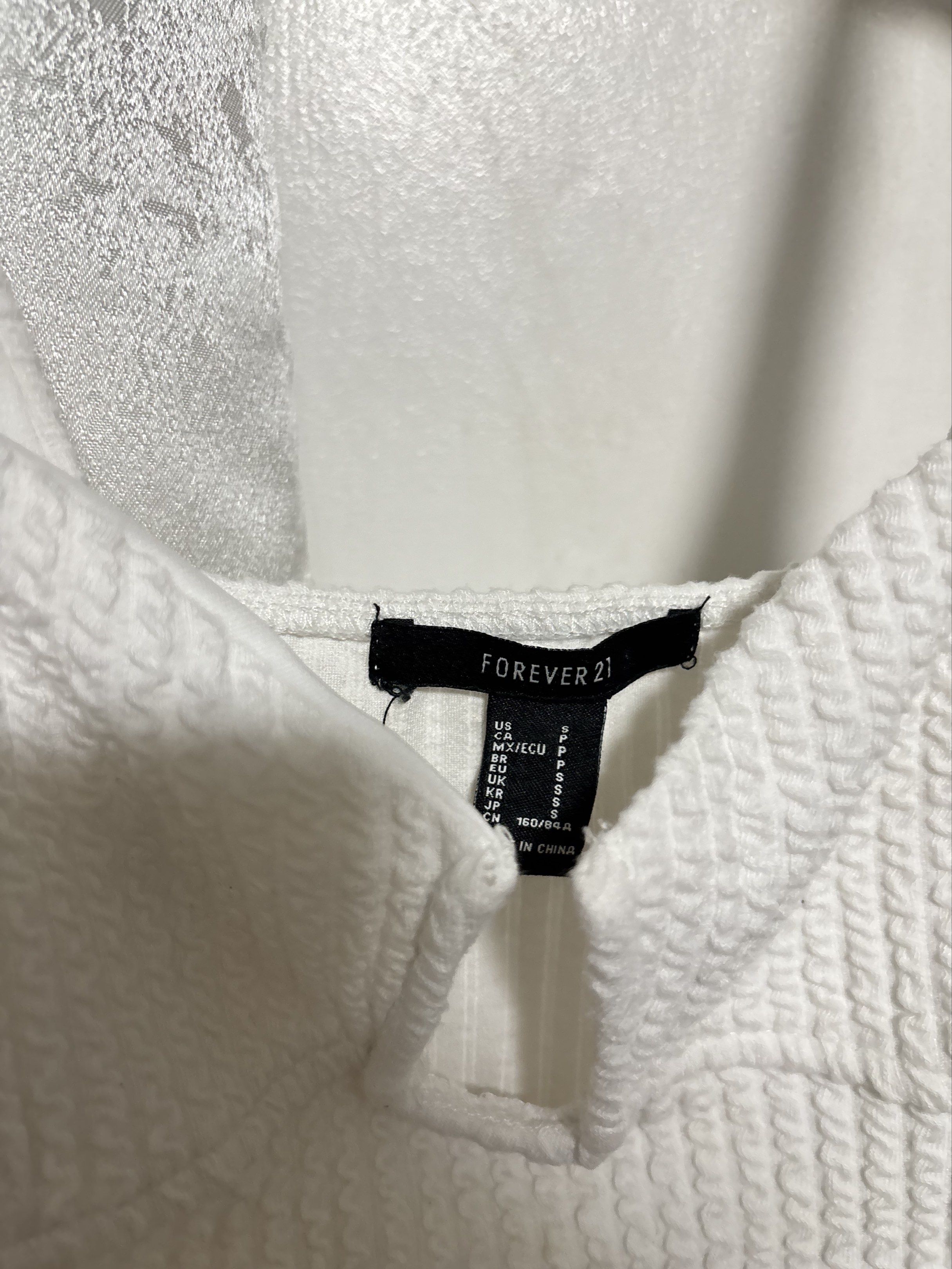 FREE SF Forever 21 White Bodysuit (Category: Others Tops) located in Pozorrubio. Submitted by ryeisdecluttering (Listing ID 1418388676, Image 2). Description: She’s serving ?! Size Small Gcash J&T express.