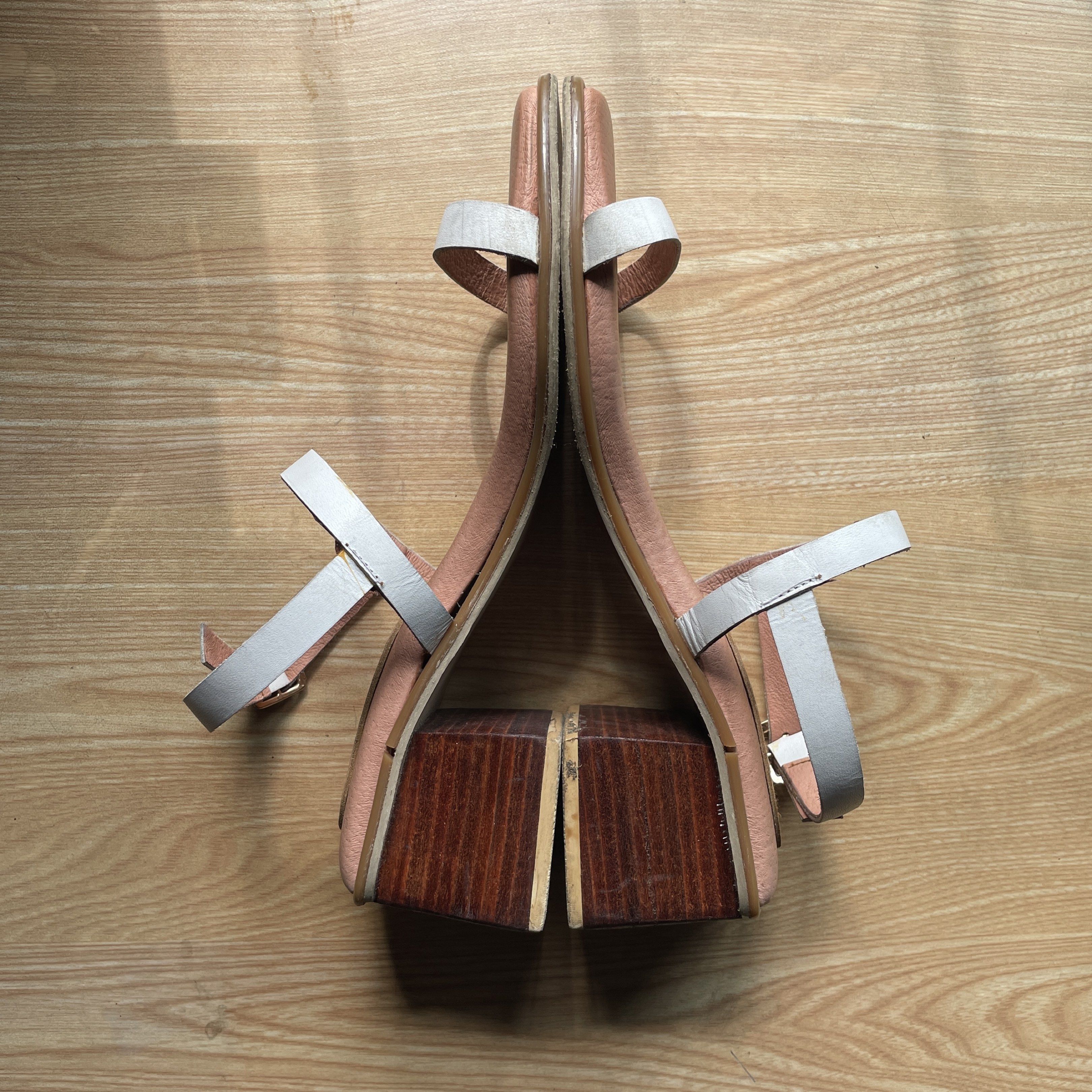 Meraniel Leather Sandals - Size 8 (Category: Flats & Sandals) located in Manila. Submitted by wakeuplittlerosebud (Listing ID 1418230457, Image 2). Description: -fits 24.5cm long foot - White strap design - Block heel - Light pink footbed, lightly cushioned -with flaws, please check photos. Shoes have been scrubbed with saddle soap though! -only used a couple of times! .