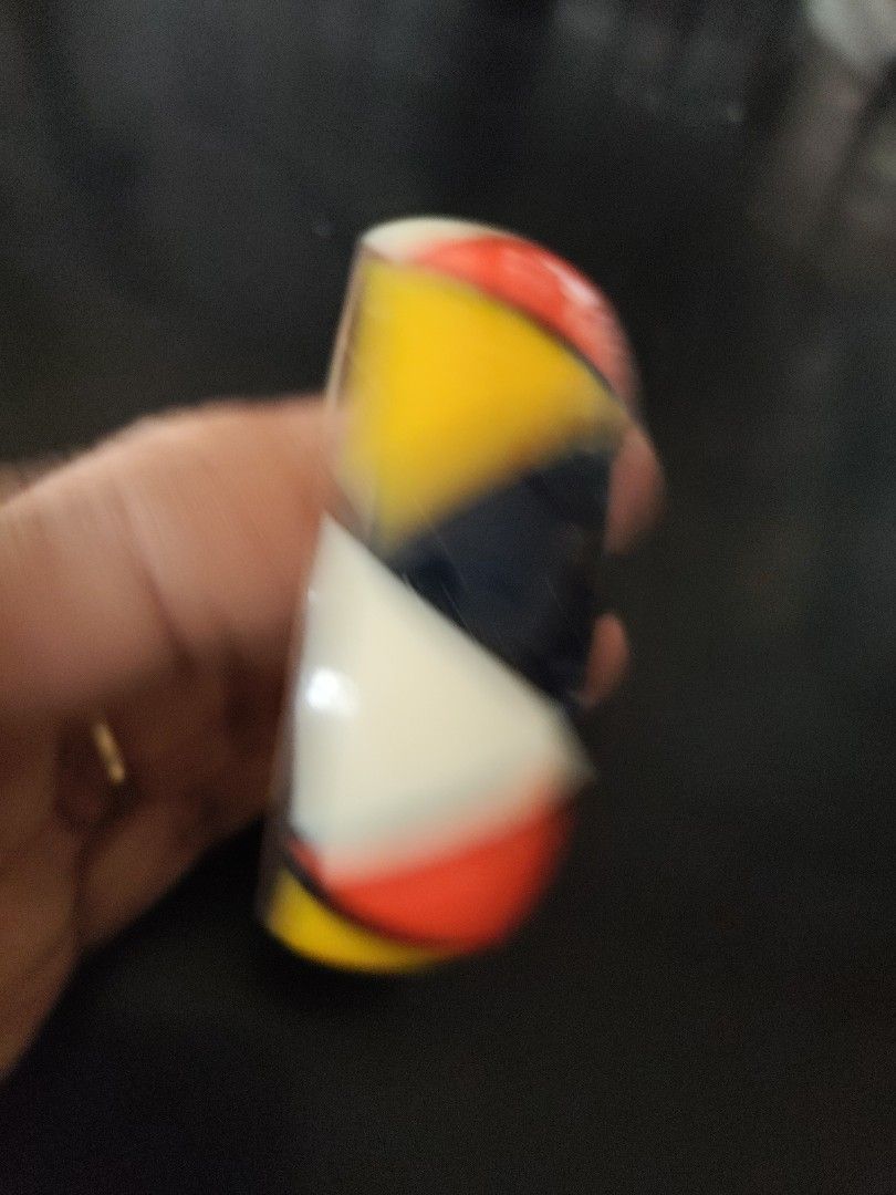 Geometric Pattern Bangle (Category: Bracelets) located in Seri Kembangan. Submitted by raennjaafar (Listing ID 1418221243, Image 2). Description: - Eye-catching bangle with a colorful geometric design. - Colors: Red, yellow, white, and navy blue. - Brass Inlaid band(light weight) - Approximate inner diameter: 10cm. - Perfect accessory to brighten up your look!.