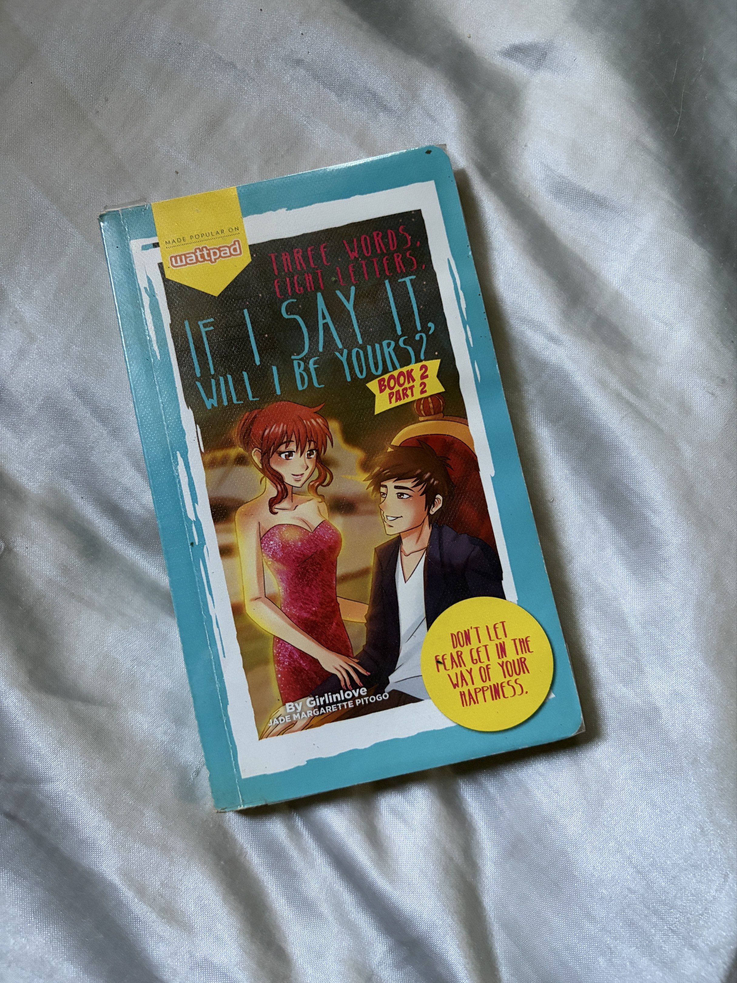 If I Say It, Will I Be Yours? Book 2 (Popfic) (Category: Storybooks) located in Quezon City. Submitted by czcsp (Listing ID 1418326355, Image 1). Description: - "If I Say It, Will I Be Yours?" Book 2 by Girlinlove - Published by Pop Fiction (Wattpad) - Romantic cover design - Shows some wear and tear on the spine - Includes a brief story summary on the back cover.